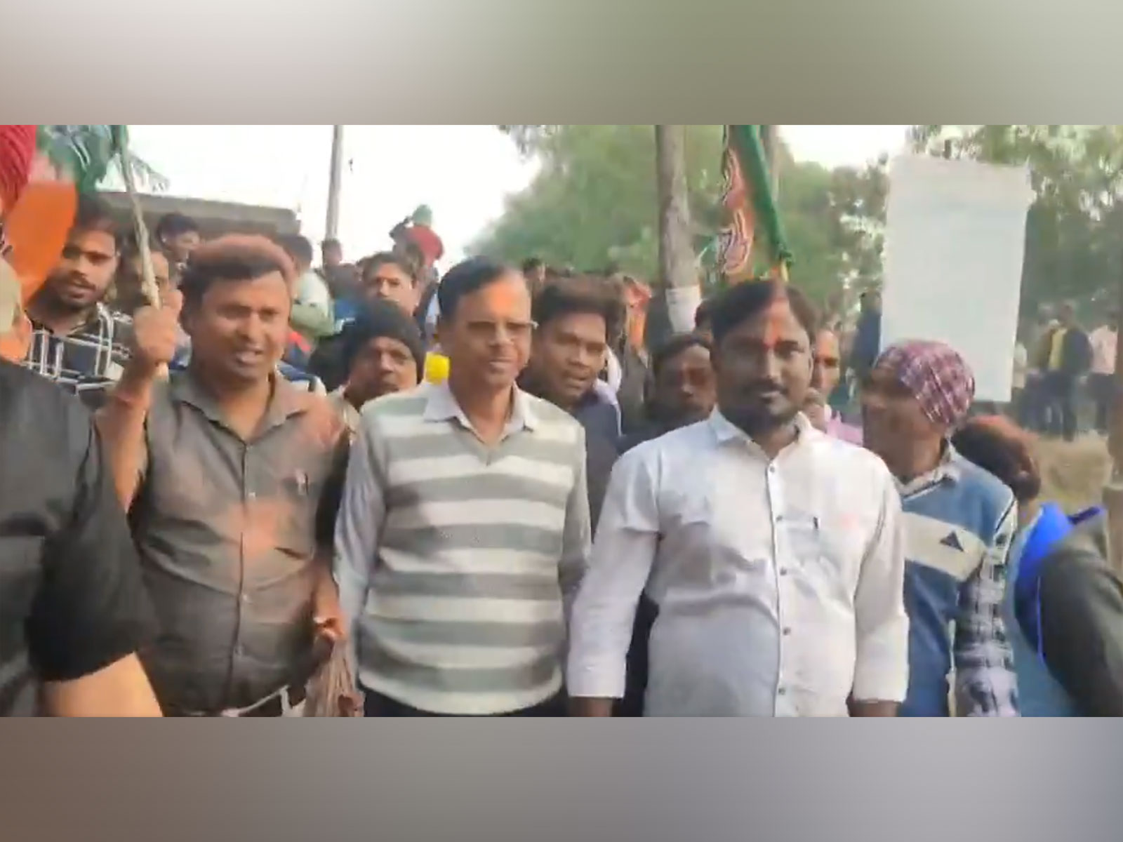 BJP workers celebrate after the party win all nine seats in Nandigram Cooperative polls. (Photo/ANI)