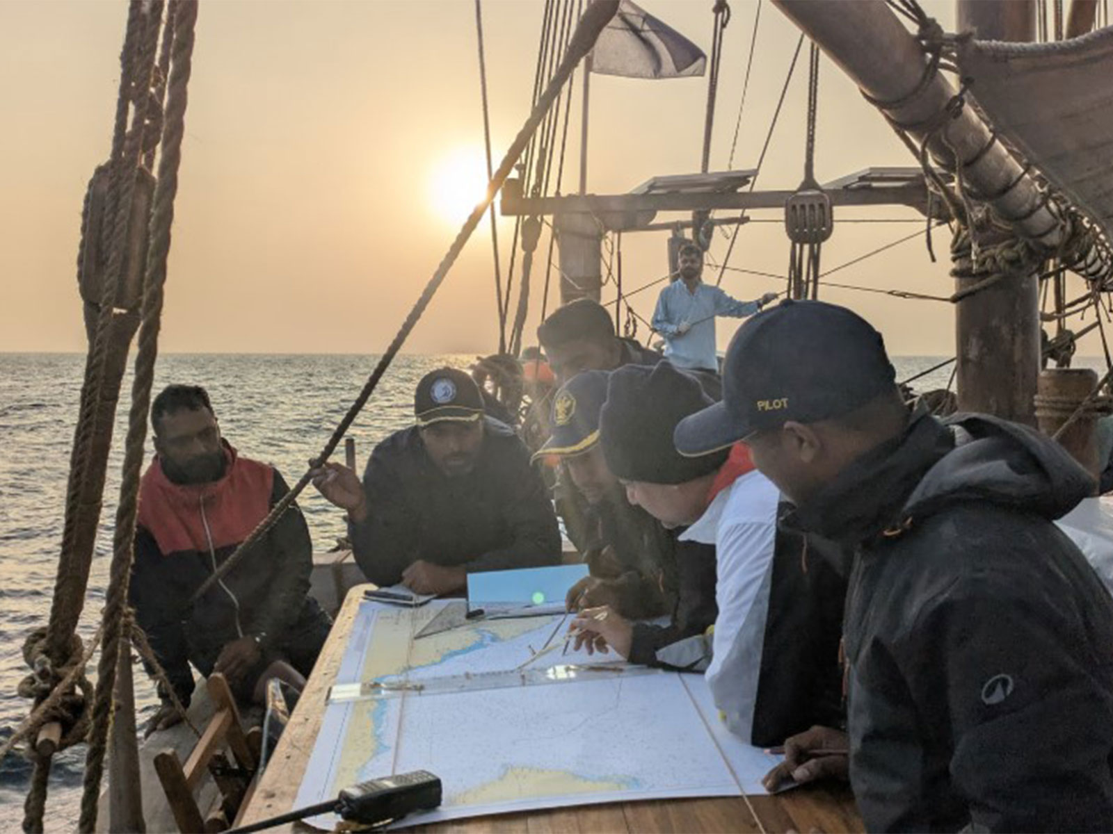 Sanjeev Sanyal with the crew members of INSV Kaundinya. (Photo/X@sanjeevsanyal)