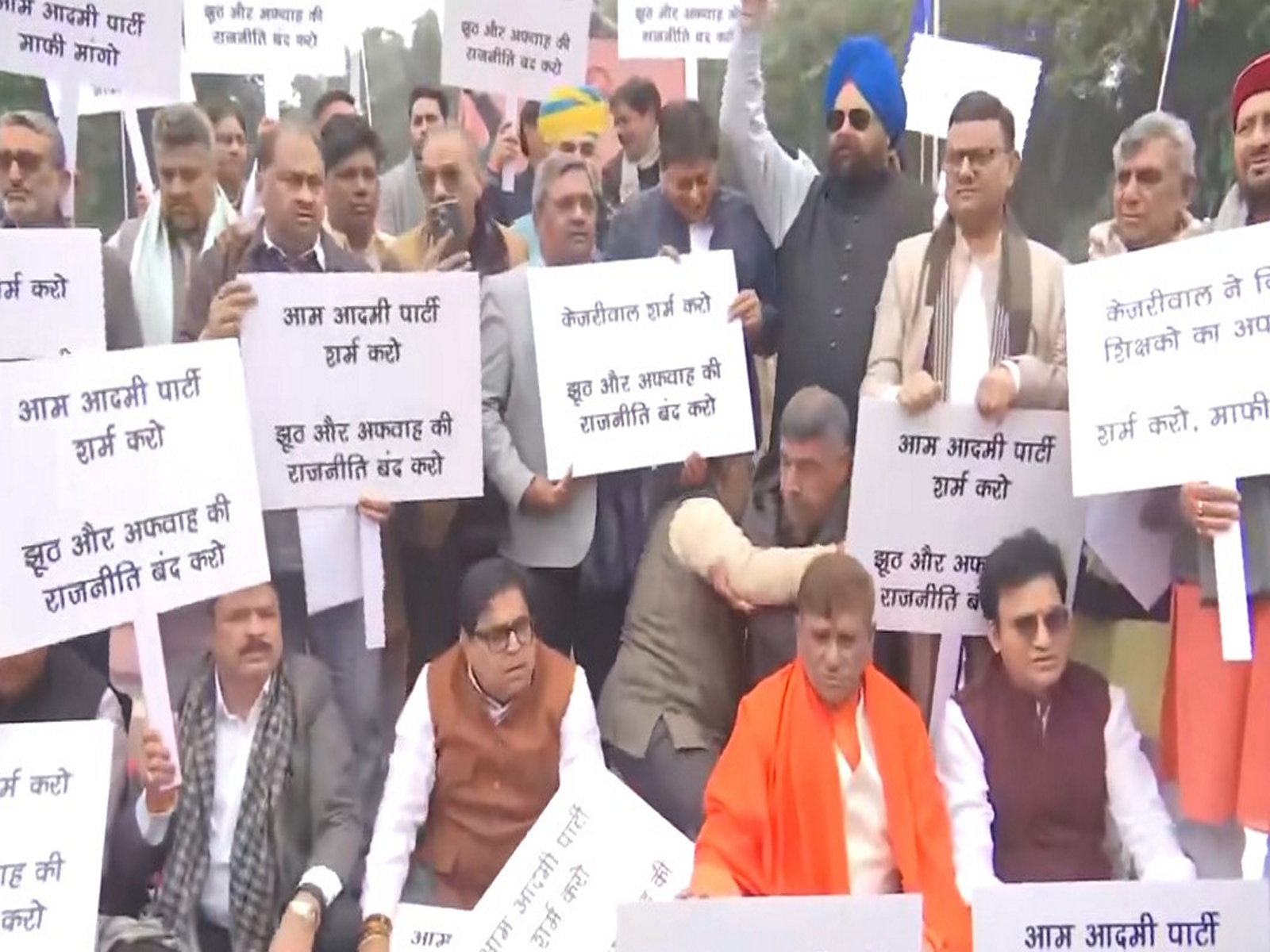 BJP Delhi MLAs staging a protest at the Delhi Assembly premises (Photo/ANI)