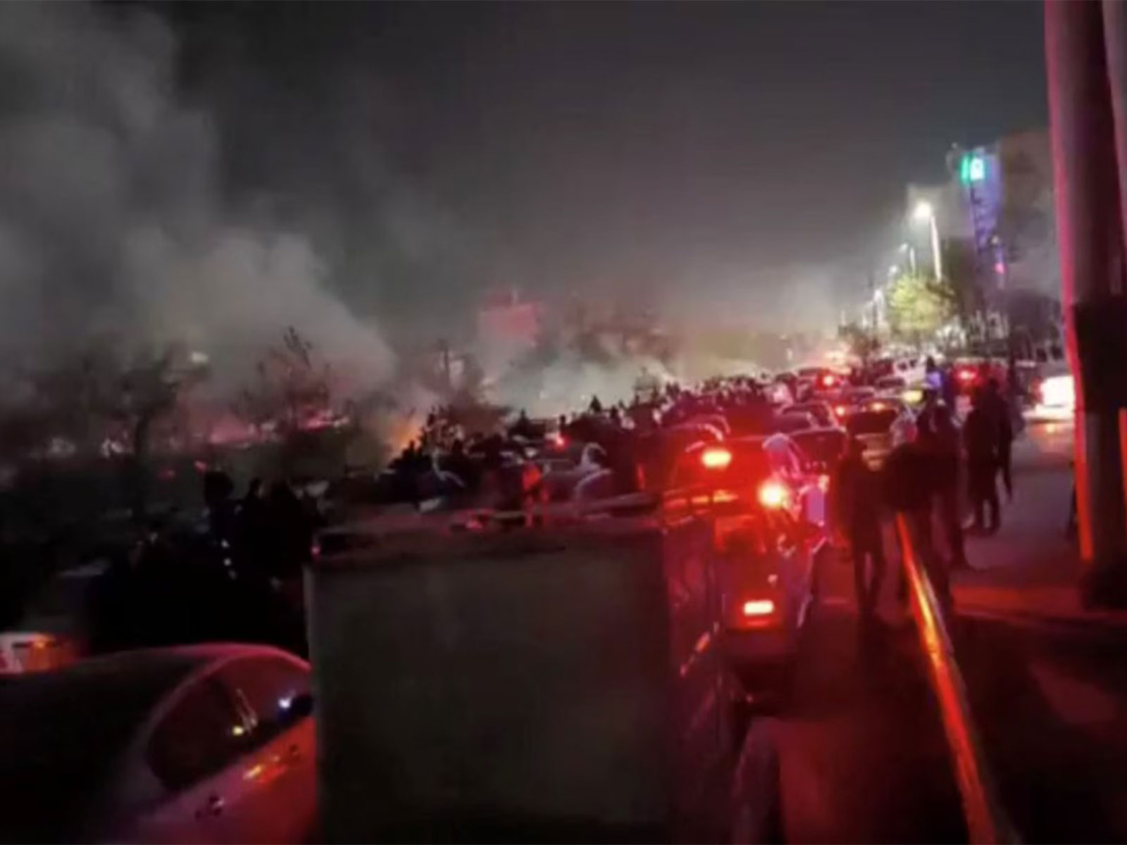 Smoke rises as protesters gather amid ongoing anti-government protests in Mashhad, Razavi Khorasan province, Iran. (Photo/Reuters)