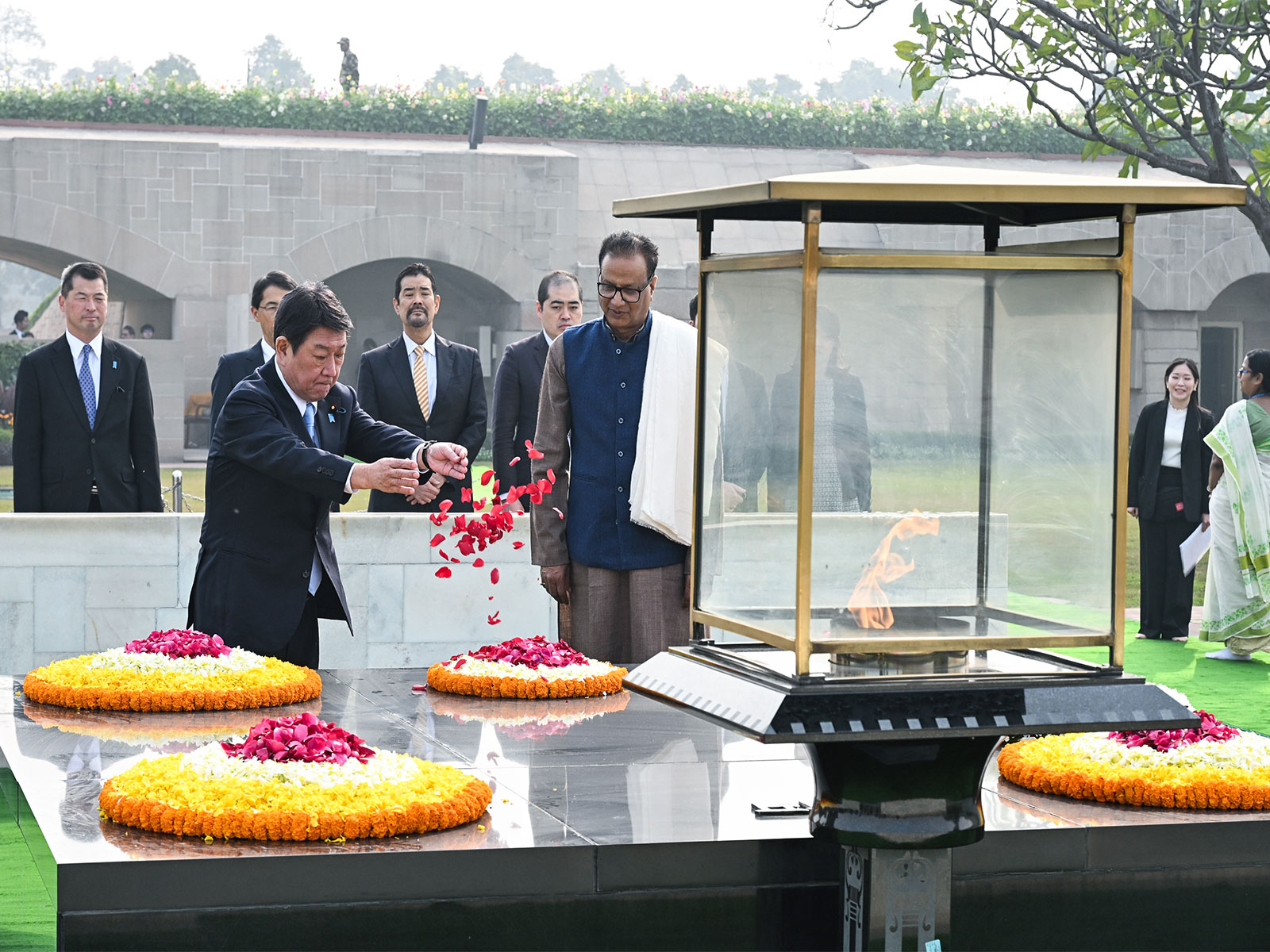 Japanese Foreign Minister Motegi pays tributes at Raj Ghat (Photo/ANI)