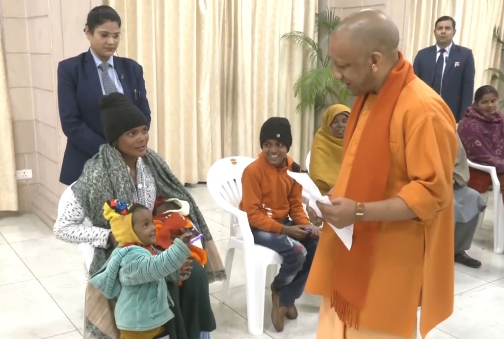 Uttar Pradesh Chief Minister Yogi Adityanath interacts with children at ‘Janta Darshan’ in Lucknow (Photo/ANI)