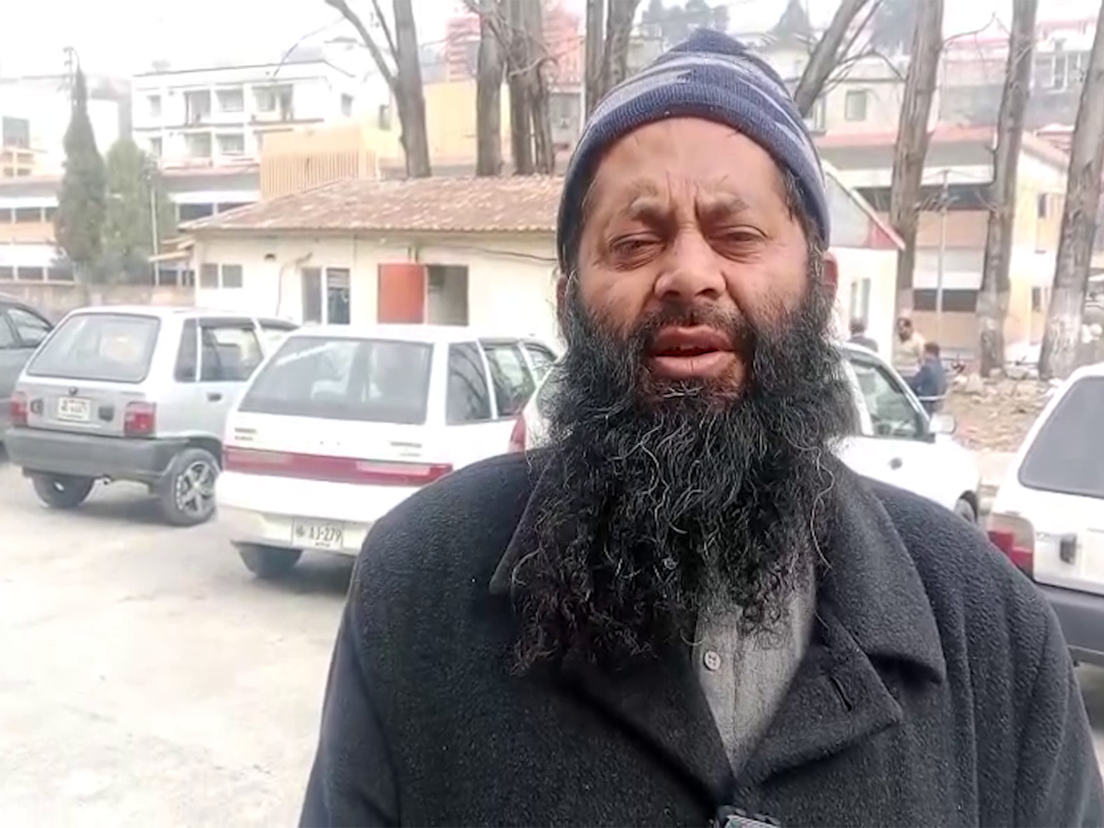 Maulana Muhammad Altaf Butt, a local leader, speaks on delays in rehabilitation and unfinished reconstruction projects, 21 years after the devastating earthquake. (Photo/ANI)
