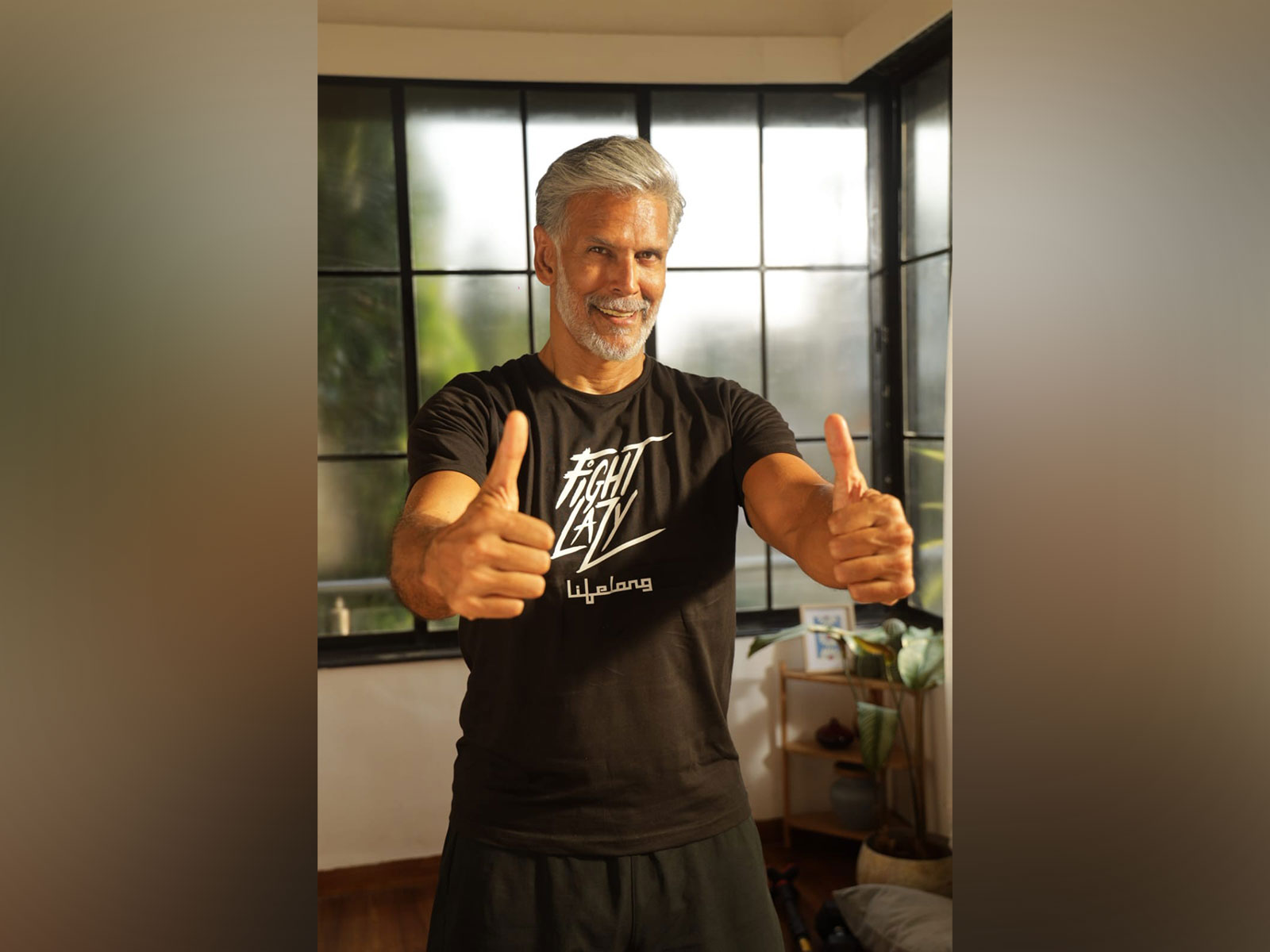 Milind Soman leading a community run at The Wellness Carnival 2026, powered by Lifelong
