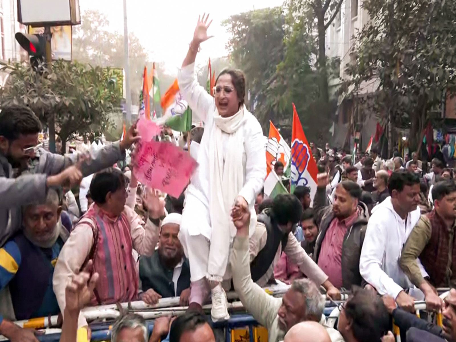 Congress workers protest outside the office of the Election Commission in in Kolkata against the SIR (Photo/ANI)