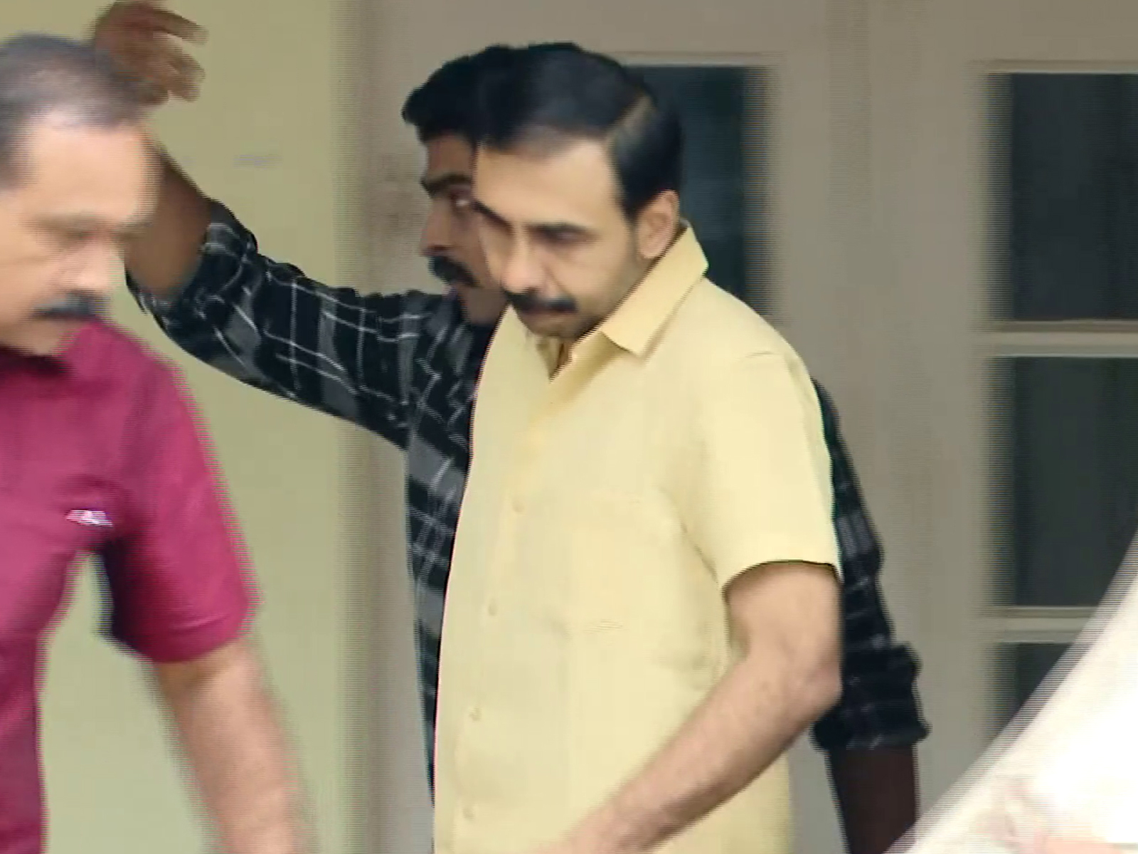 Unnikrishnan Potti (Yellow Shirt) (File Photo/ANI)