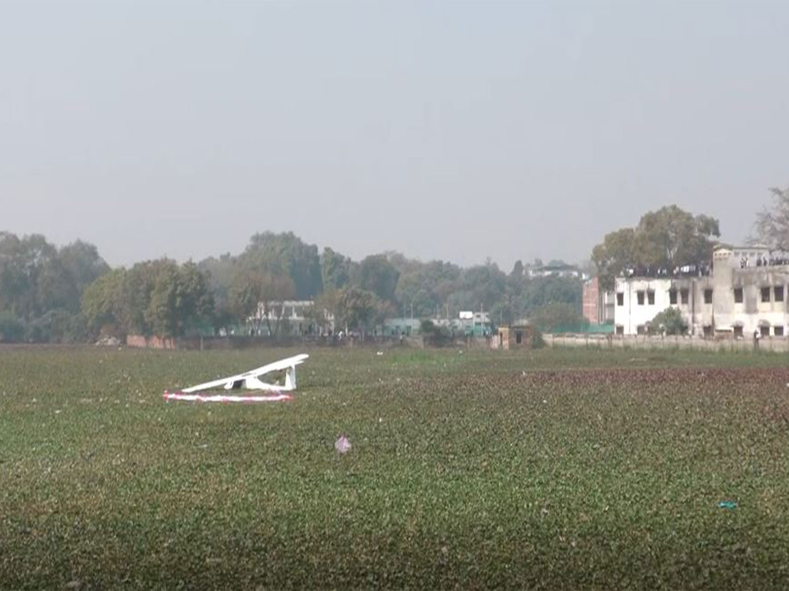 IAF trainee aircraft crashes into pond in Prayagraj (Photo/ANI)