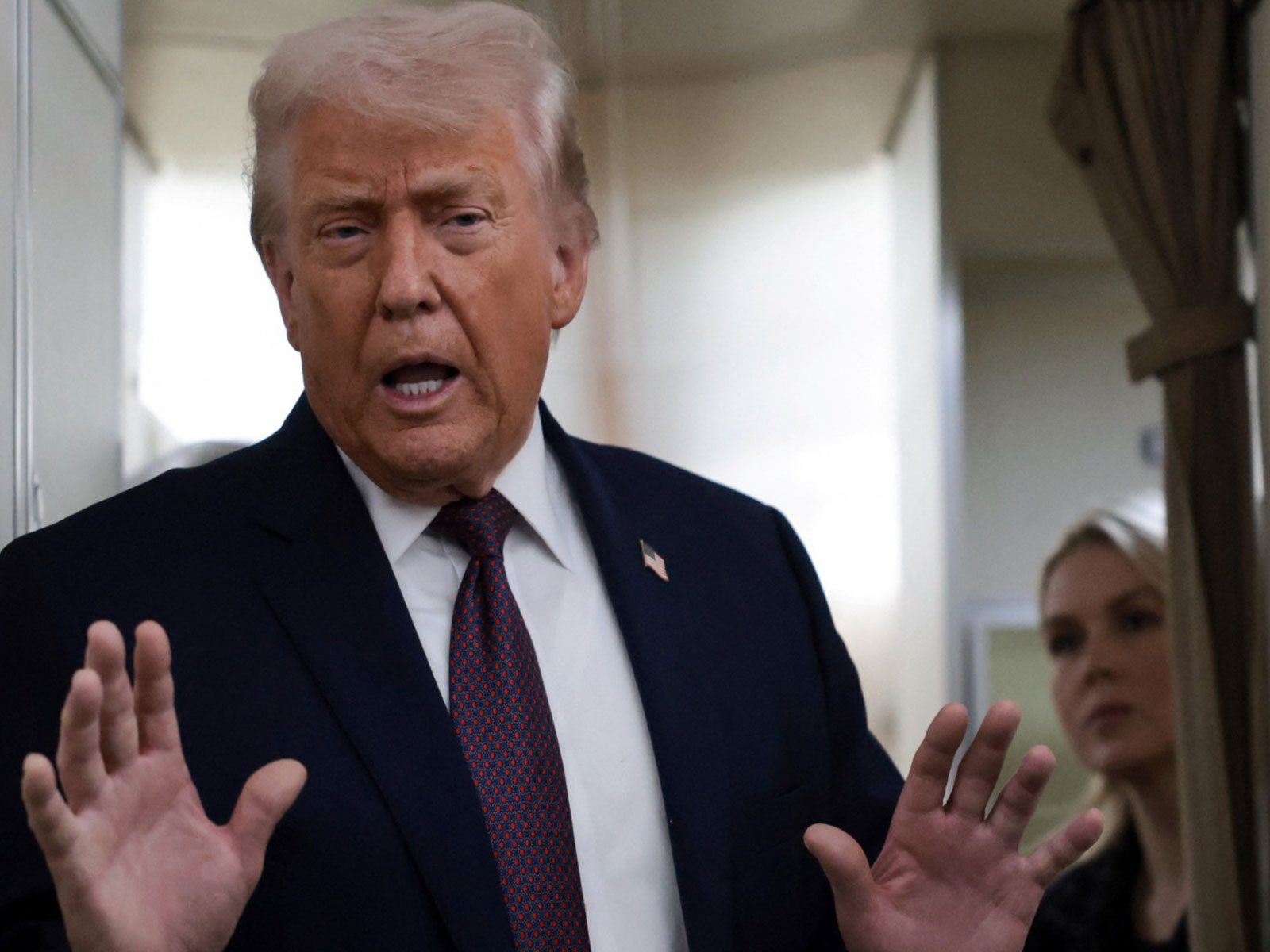  US President Donald Trump speaks to reporters over the North Atlantic as he returns to Washington from the World Economic Forum (WEF) in Davos, Switzerland, aboard Air Force One (Photo/Reuters)