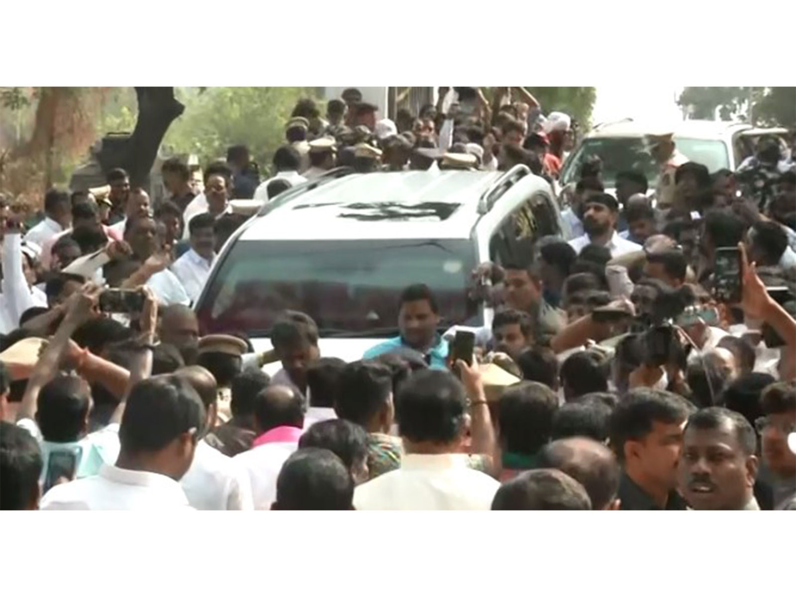 BRS working president K. T. Rama Rao arrives in Jubilee Hills as party workers protest around him (Photo/ANI)