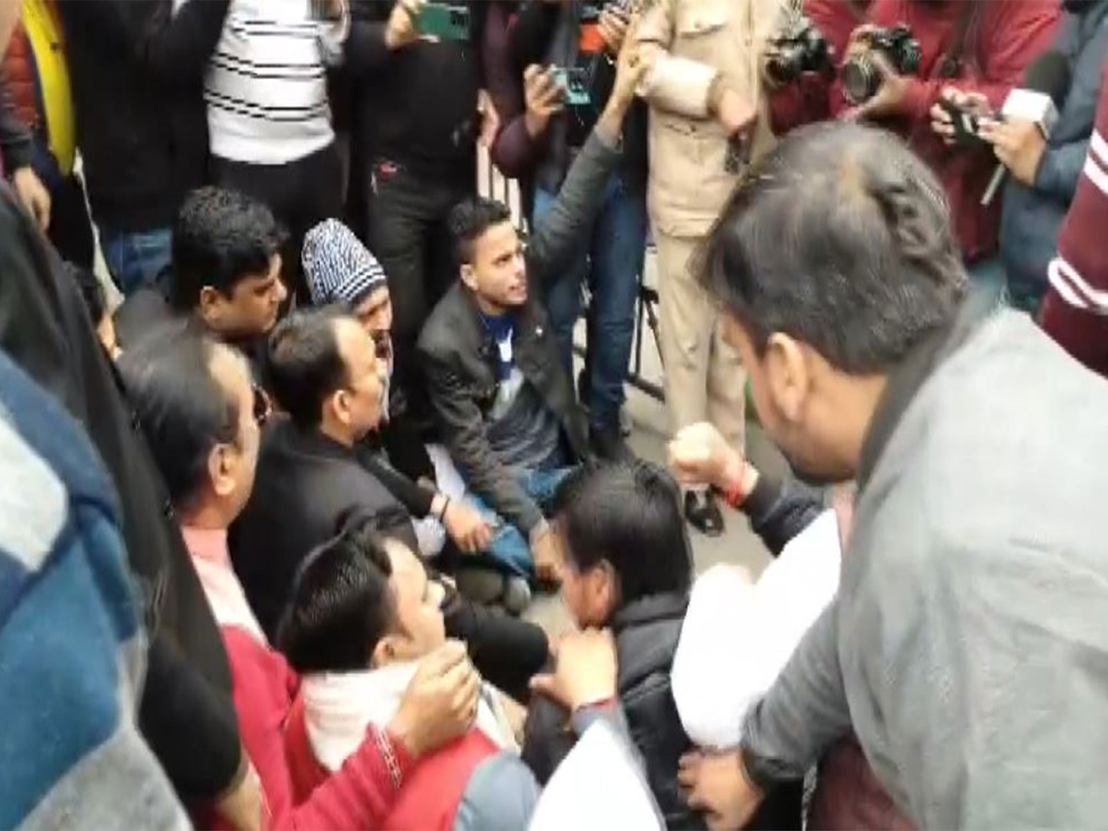 Alankar Agnihotri sits on protest outside DC office in Bareilly (Photo/ANI)