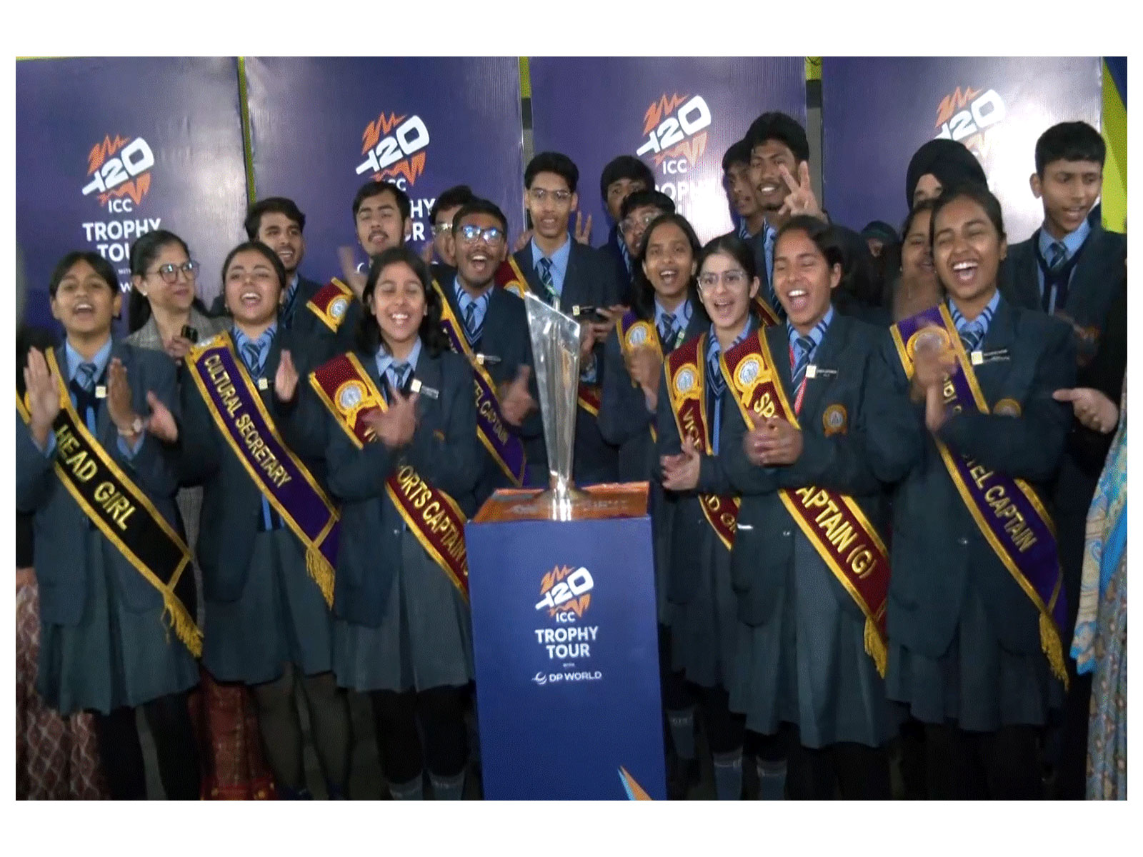 Students posing with the T20 World Cup trophy (Photo/ANI)