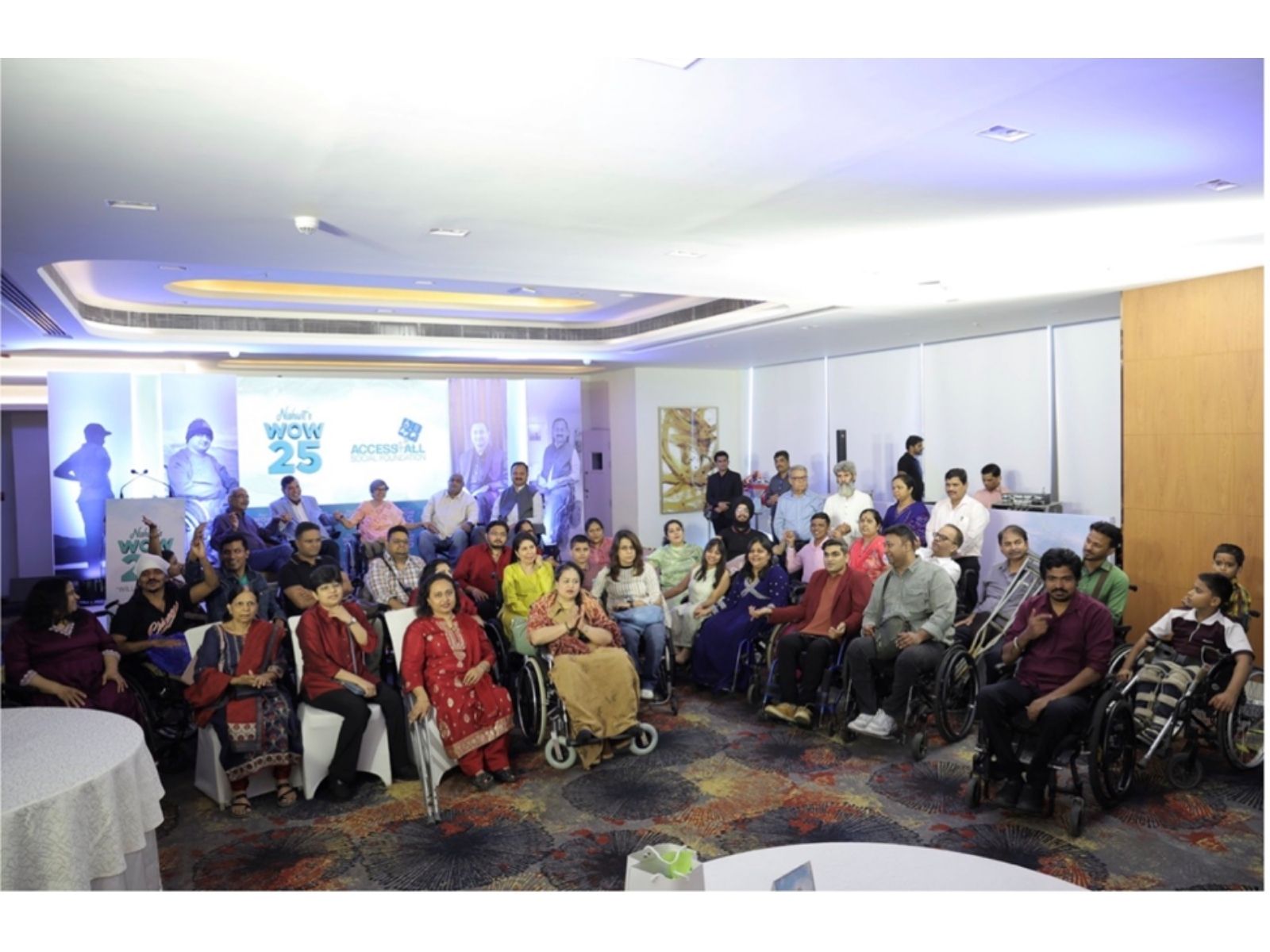 Dr. Pravin Amin, Mr. Shivjeet Singh Raghav, Dr. Ketna Mehta, Shri Arvind Prabhoo and Nishant Khade with the wheelchair community at the Will on Wheelz event.