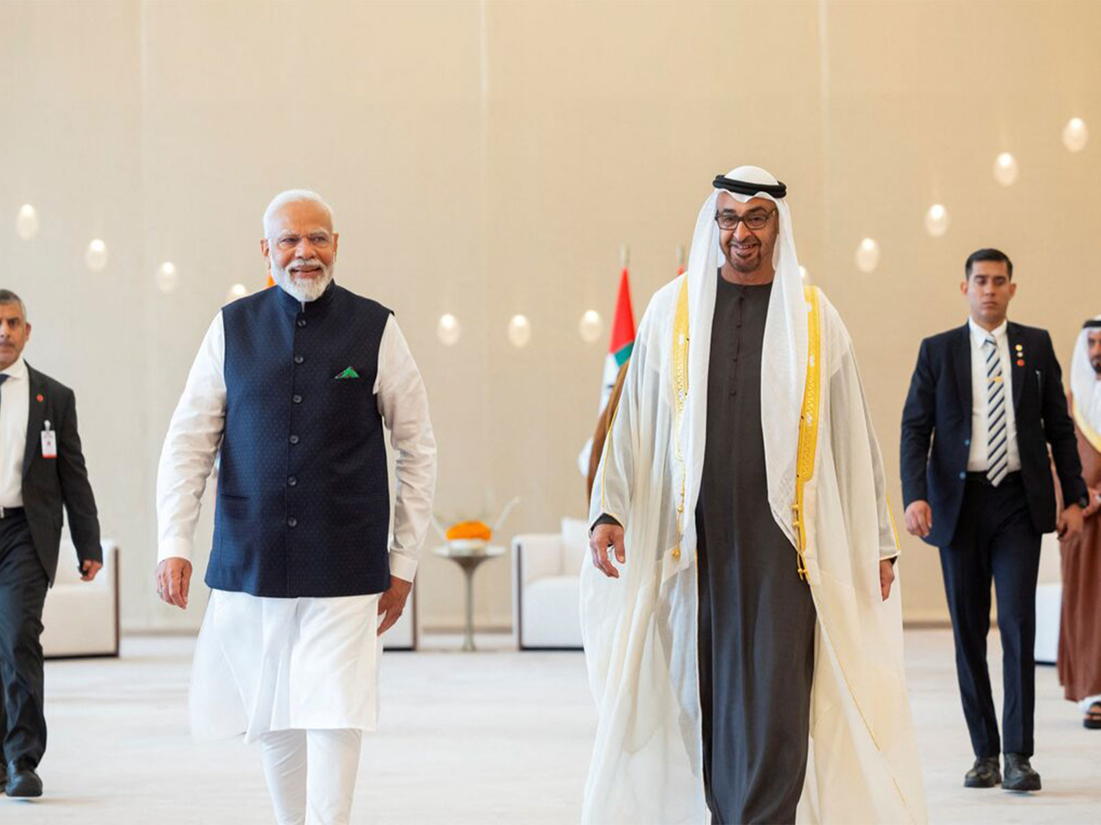 UAE President Sheikh Mohamed bin Zayed Al Nahyan walks with Prime Minister Narendra Modi during a reception at the Presidential Airport in Abu Dhabi, United Arab Emirates. (Photo/Reuters) UAE President Sheikh Mohamed bin Zayed Al Nahyan walks with Prime Minister Narendra Modi during a reception at the Presidential Airport in Abu Dhabi, United Arab Emirates. (Photo/Reuters)