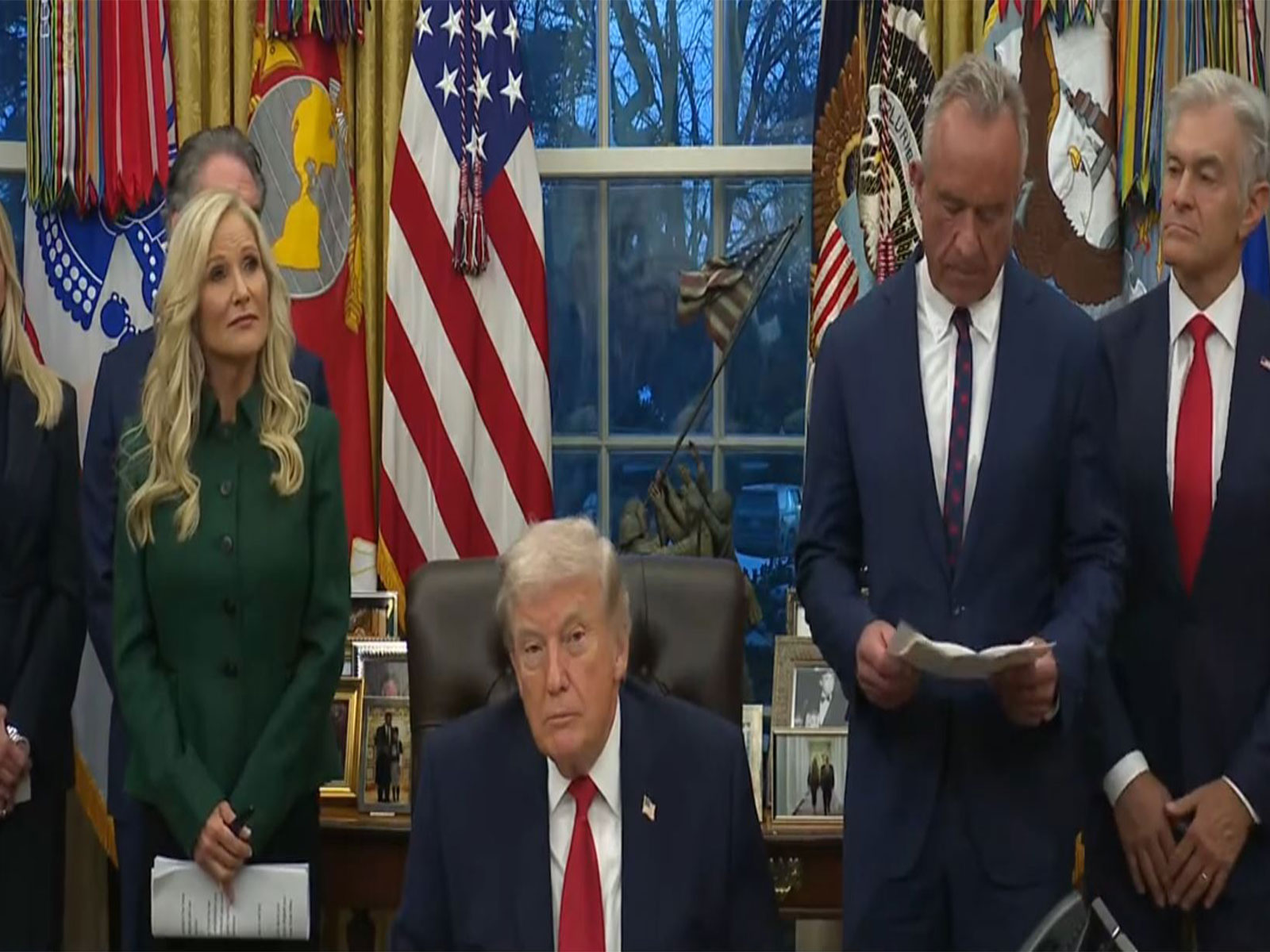 US President Donald Trump signs an executive order launching the Great American Recovery Initiative at the White House. (Image Source: The White House/YouTube)