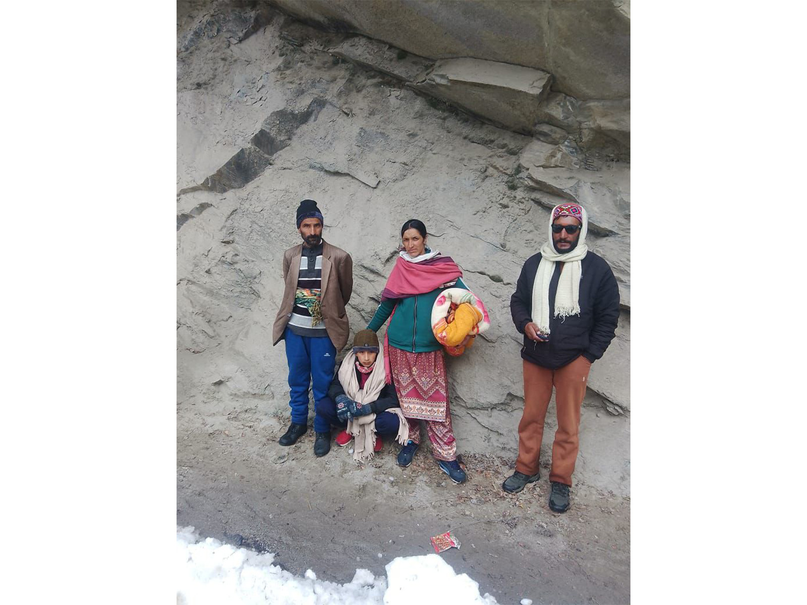 A 14 year teen was caried on shoulders to hospital in Killar village in snow covered Chamba district (Photo/ANI)