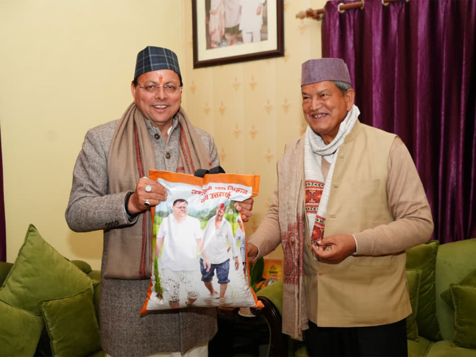 Uttarkhand CM Pushkar Singh Dhami meets senior leader Harish Rawat (Photo/ANI)