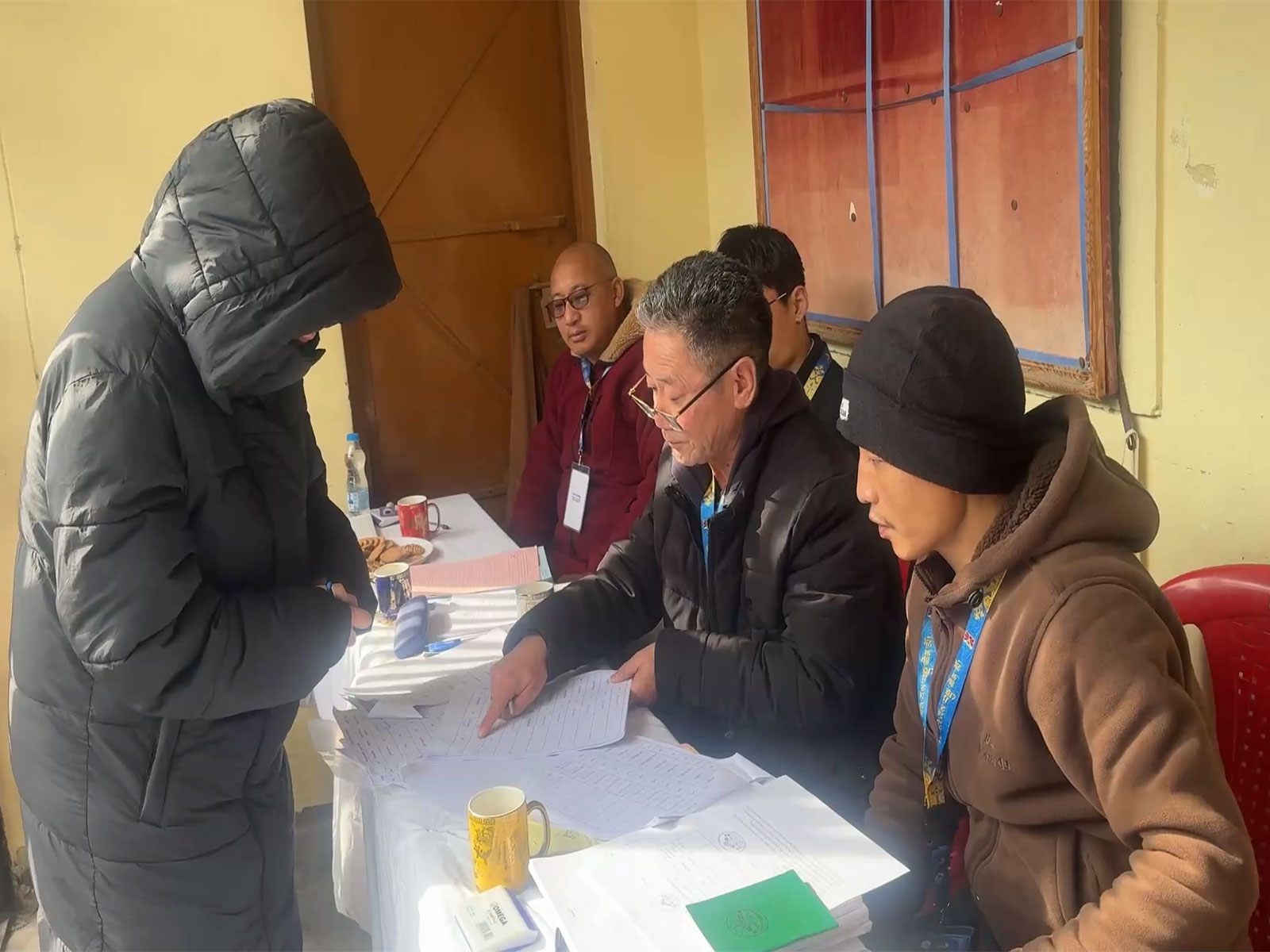 A Tibetan participates in election process (Photo/ANI) A Tibetan participates in election process (Photo/ANI)