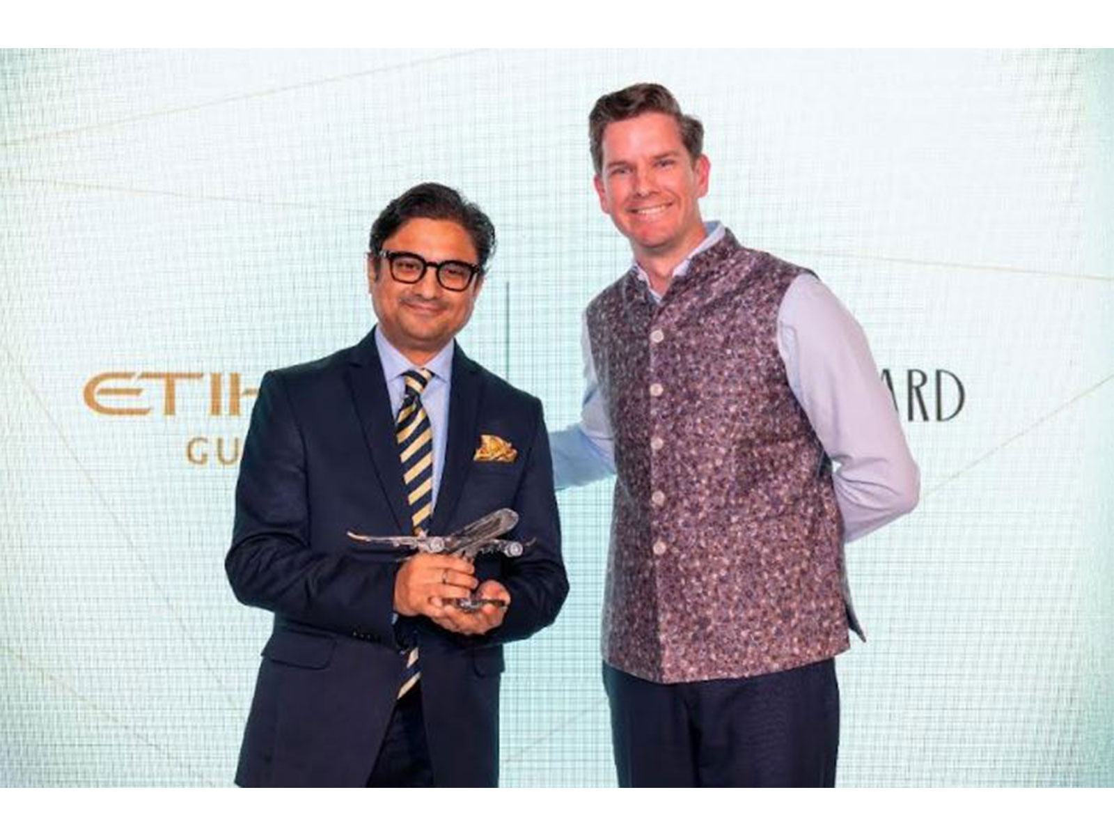 (L to R) Mr Anirudh Kandpal, Co-Founder and Senior Vice President, The Postcard Hotel, and Mr Mark Potter, Managing Director, Etihad Guest - celebrate the launch of the new partnership