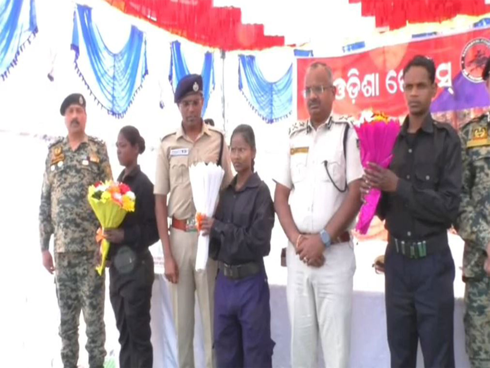 Four Maoists surrender before Southern Range IG Niti Shekhar at Police Reserve Office (Photo/ANI)