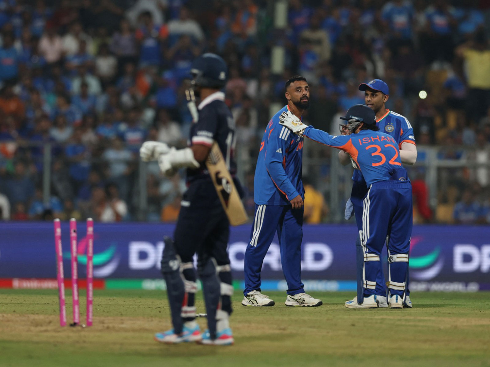 Varun Chakravarthy celebrating a wicket. (Photo: Reuters)