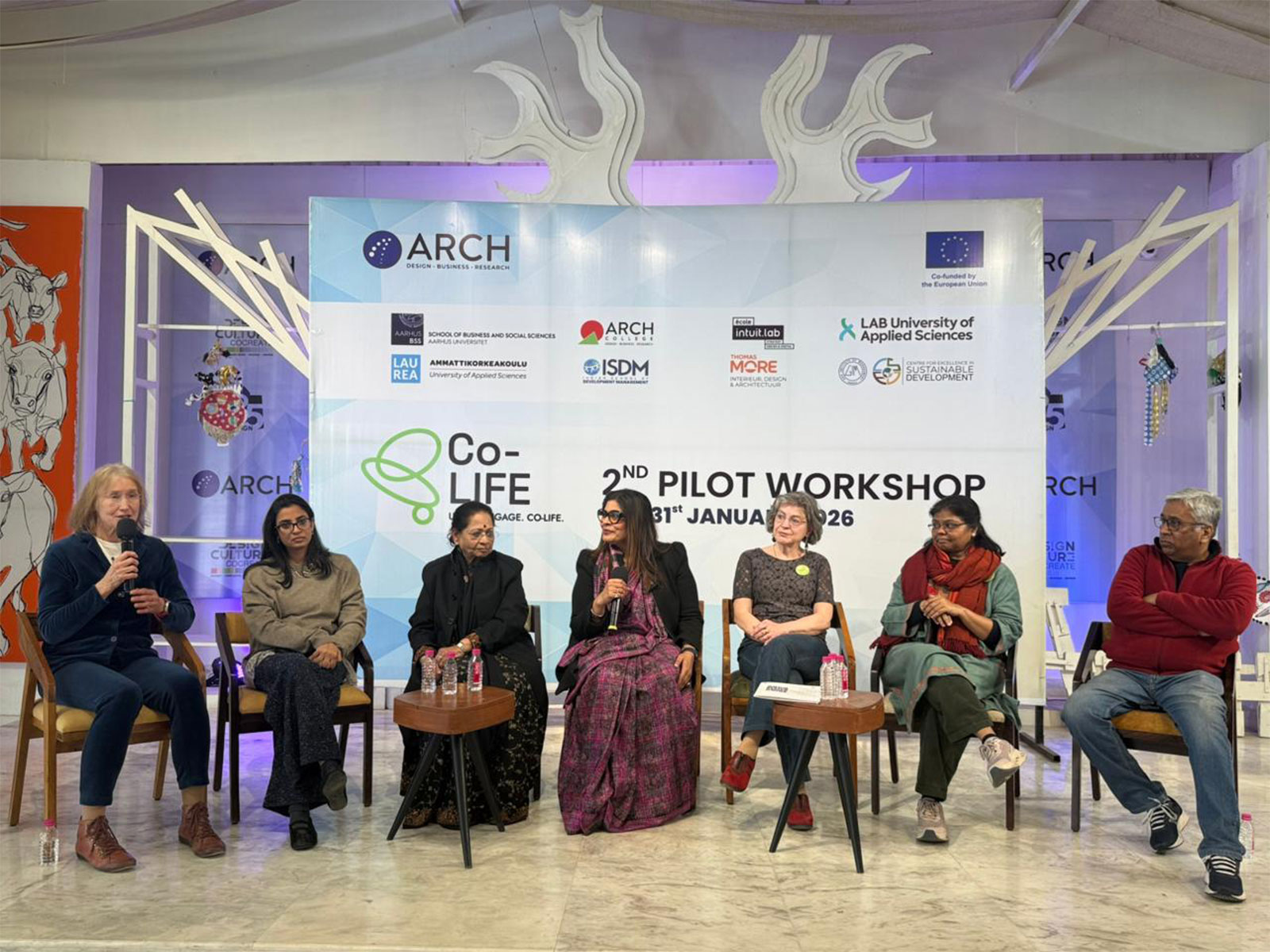 The panel discussion at the ARCH campus with industry leaders, Co-LIFE international delegates, and school educators