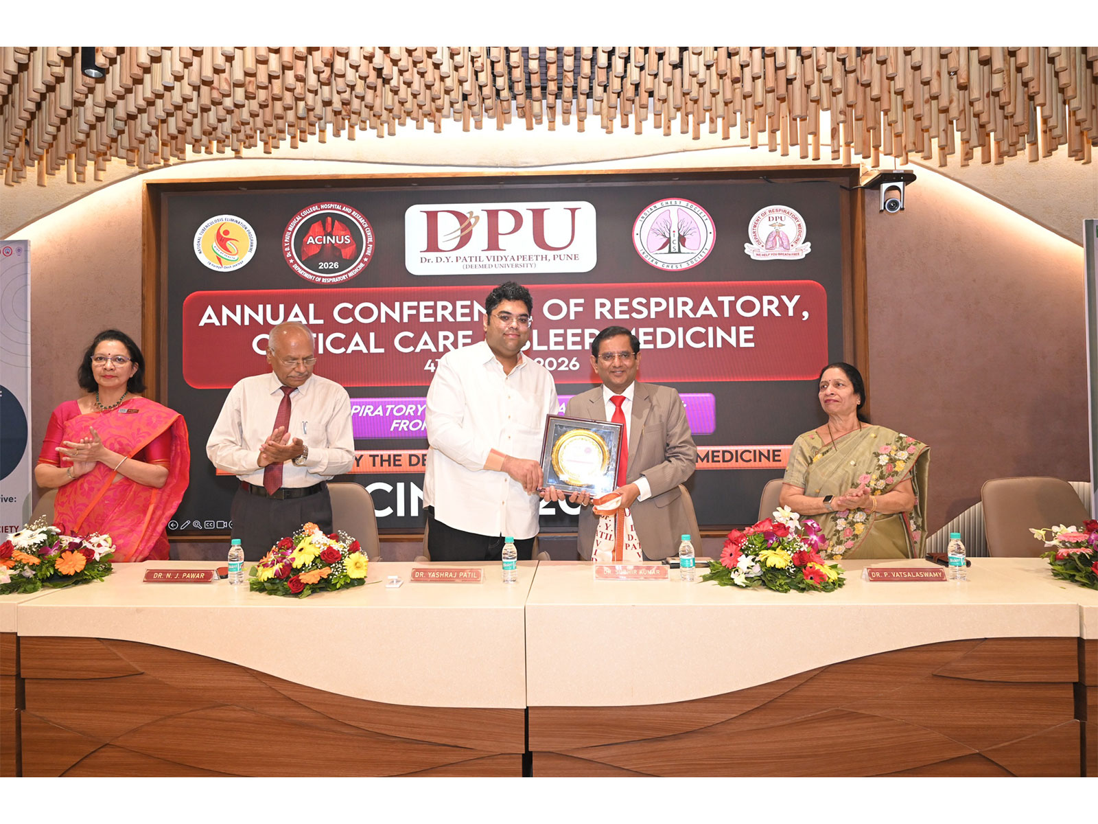 Dr. Yashraj P. Patil and other dignitaries at the ACINUS Conference