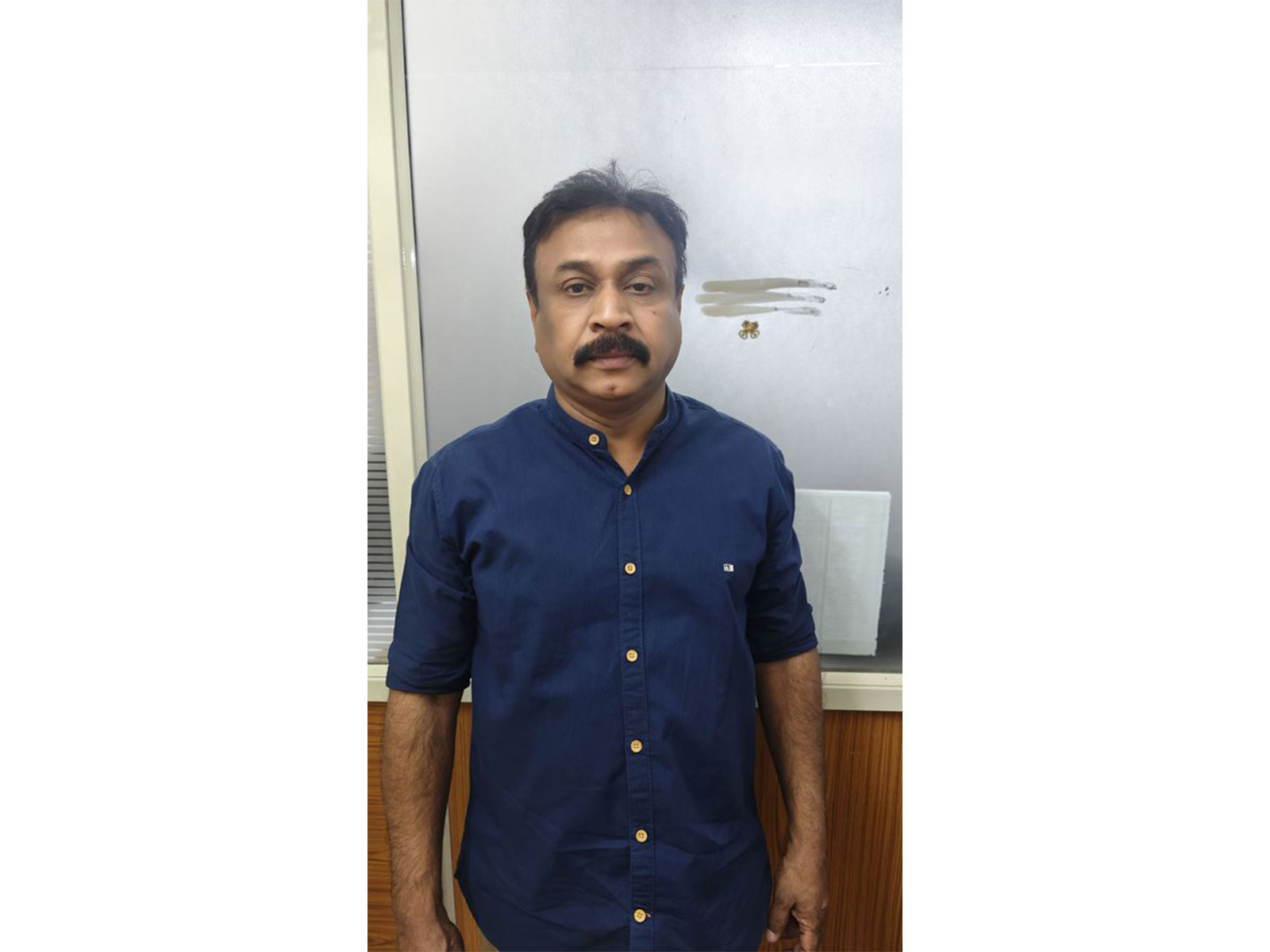 Suresh (car driver) (Photo/ Bengaluru Police)