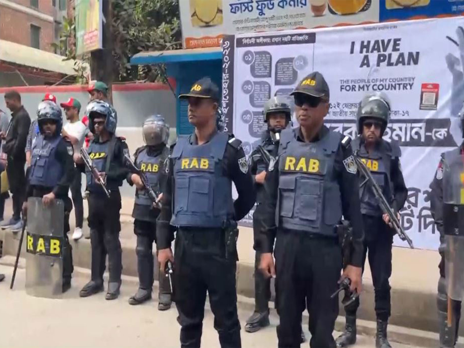 Members of the Rapid Action Battalion at Gulshan Model High School & College Polling Station as voting is underway in Bangladesh (Photo/ANI)