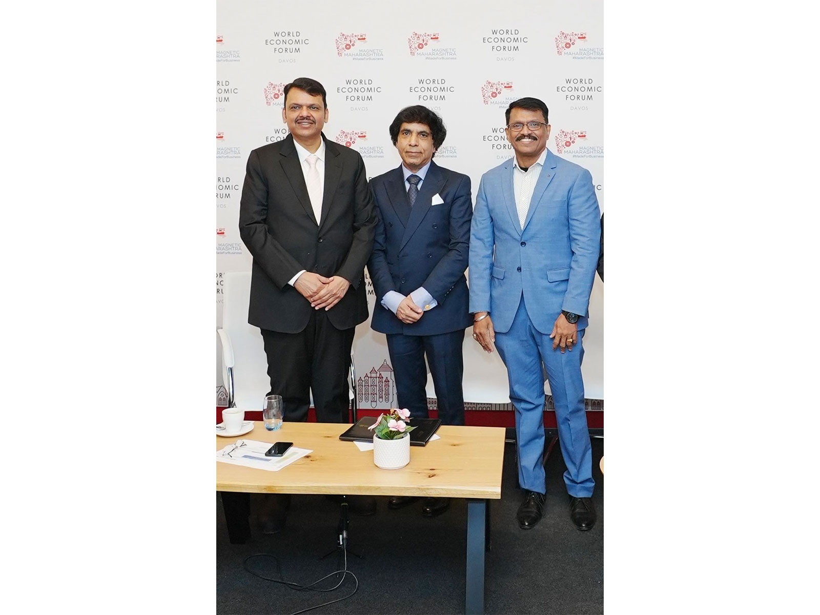 Shri Devendra Fadnavis, Hon'ble Chief Minister of Maharashtra; Dr. Milind Pimprikar, Chairman, CANEUS International and Shri Binoay B, Chief Strategist, CANEUS International
