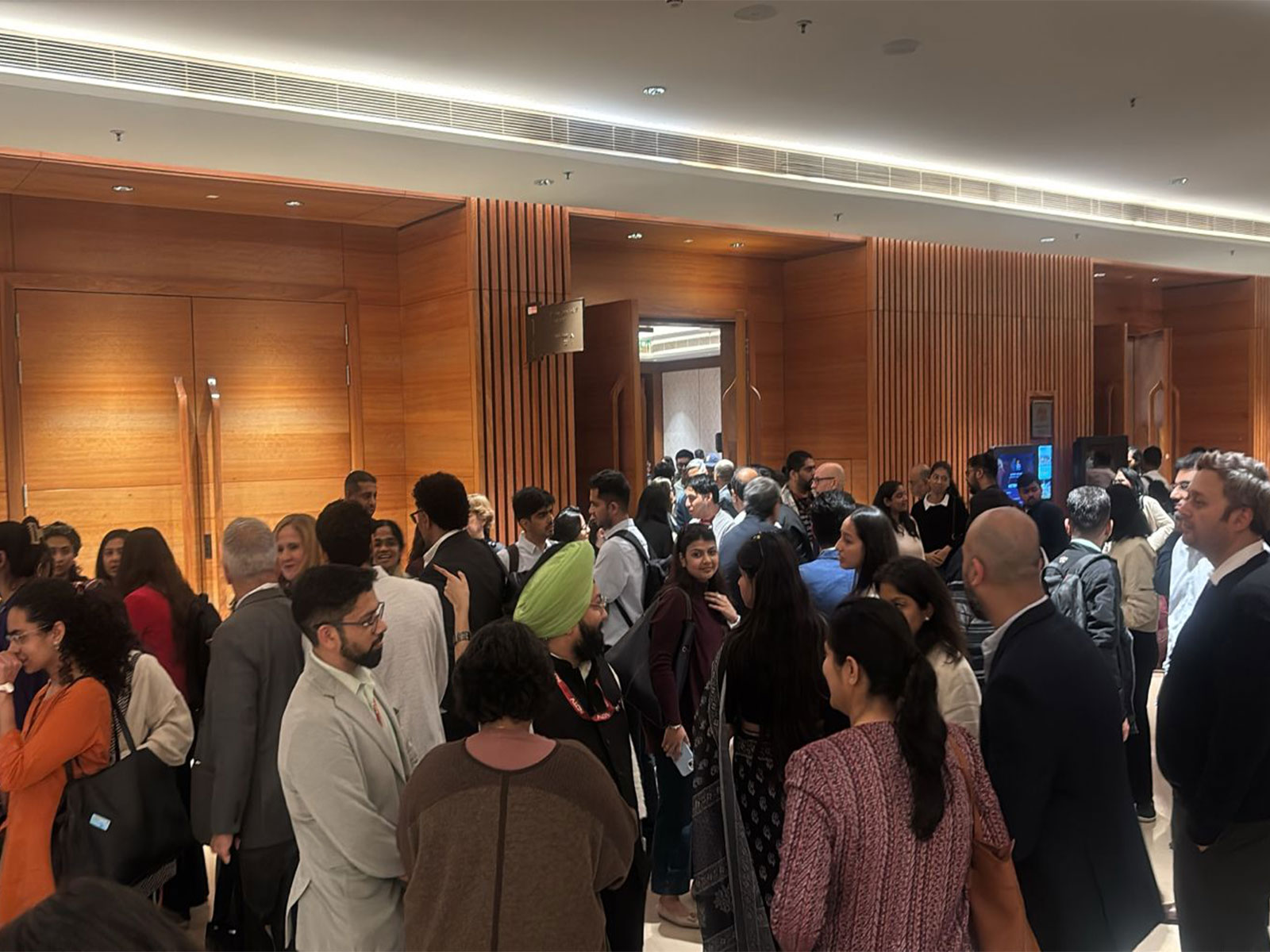 A large gathering at Bharat Mandapam in New Delhi as India hosts the AI Impact Summit 2026, themed “Sarvajana Hitaya, Sarvajana Sukhaya.” (Photo/ANI)