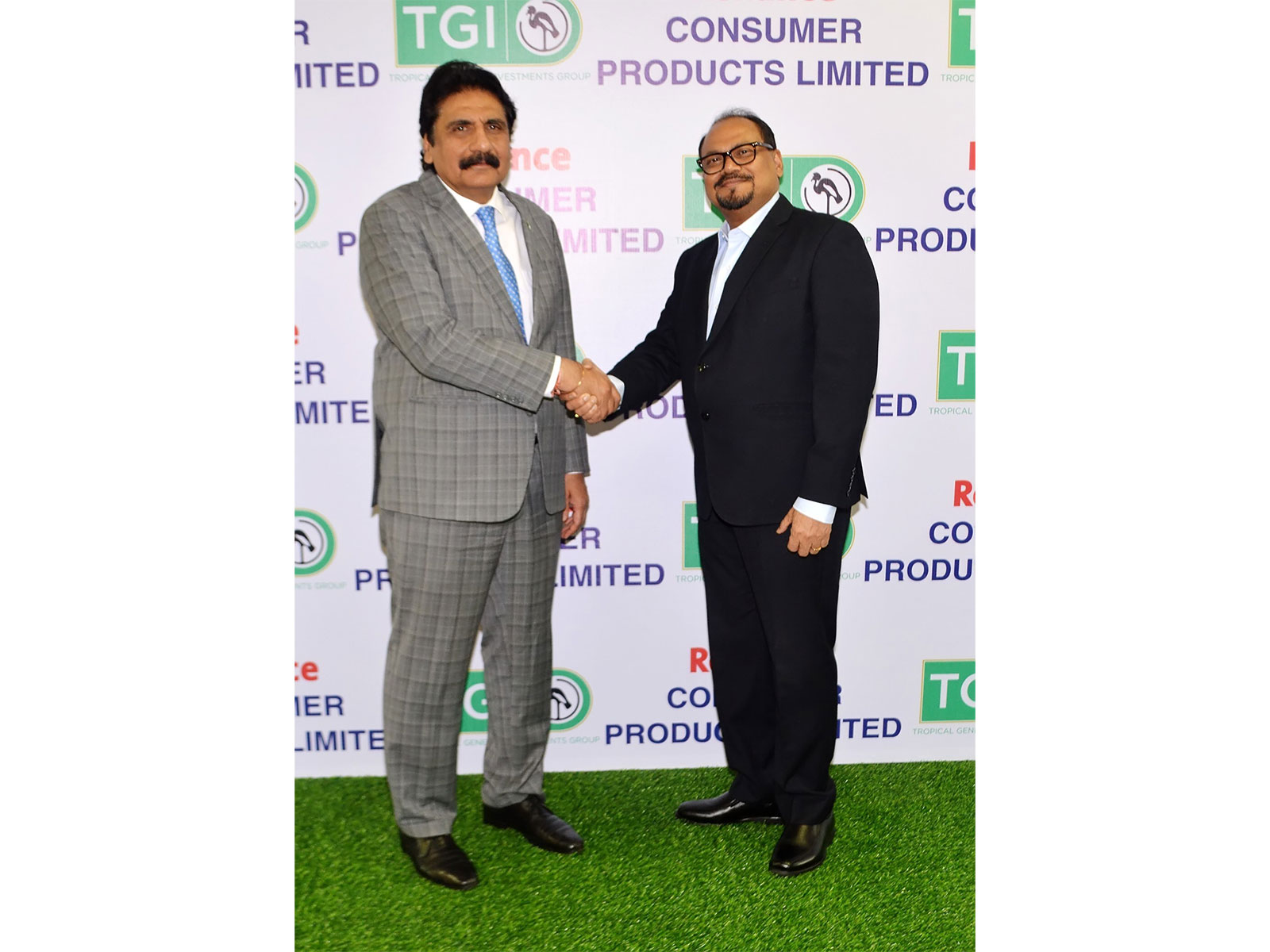 (Left to Right) Rahul Savara, Group MD, TGI Group and Tapas Kumar Mondal, Business Head - International Business, RCPL at the signing of the Joint Venture between RCPL and TGI Group in Lagos, Nigeria. (Photo: ANI) 