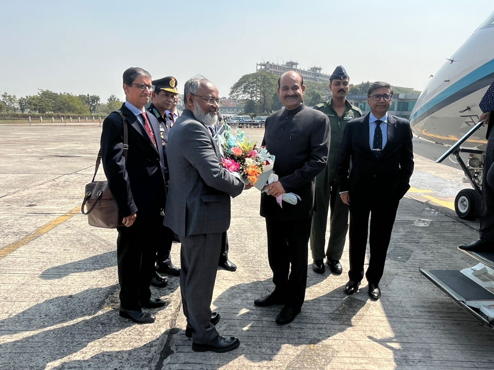 Lok Sabha Speaker Om Birla being received by Bangladesh Foreign Ministry Secretary Nazrul Islam upon his arrival in Dhaka on Tuesday. (Photo: High Commission of India)