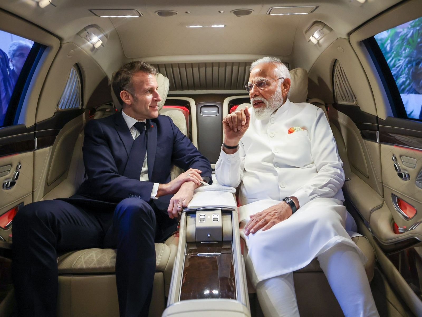 PM Modi shares ride with French President Macron (Photo/X@narendramodi)