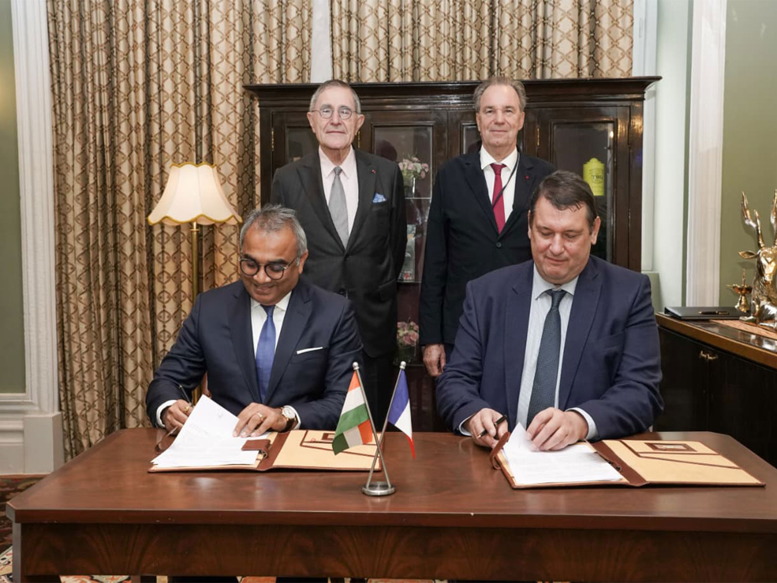 (From left to right) Ashwani Gupta, Whole-time Director and CEO, APSEZ, Herve Martel, CEO, Marseille Fos. ; Standing: Gerard Mestrallet, Special Envoy, French President for IMEC. Renaud Muselier, President of South Region (Province Alpes Côté d'Asur) (Photo- Adani Group)