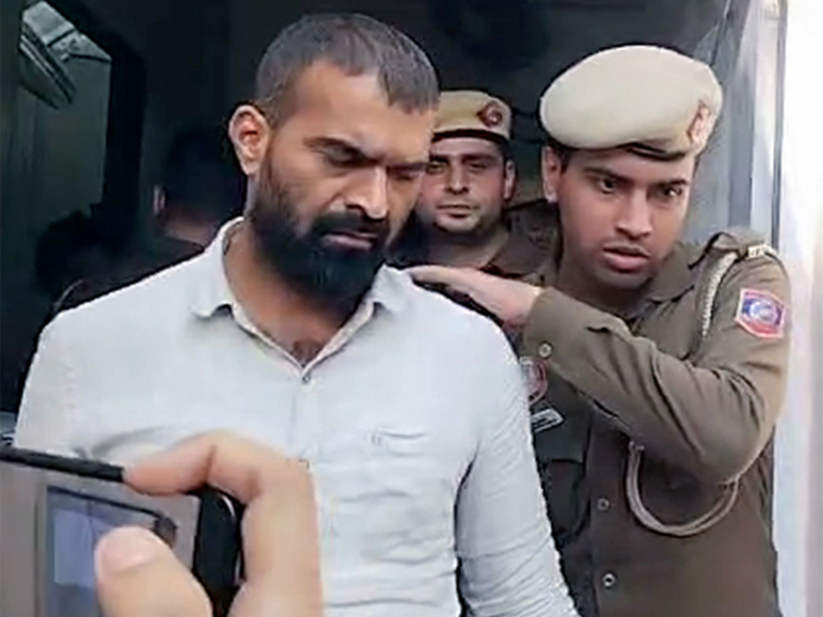 Indian Youth Congress workers brought to Patiala House Court by the police in connection with their protest at the AI ​​Summit at Bharat Mandapam (Photo/ANI)