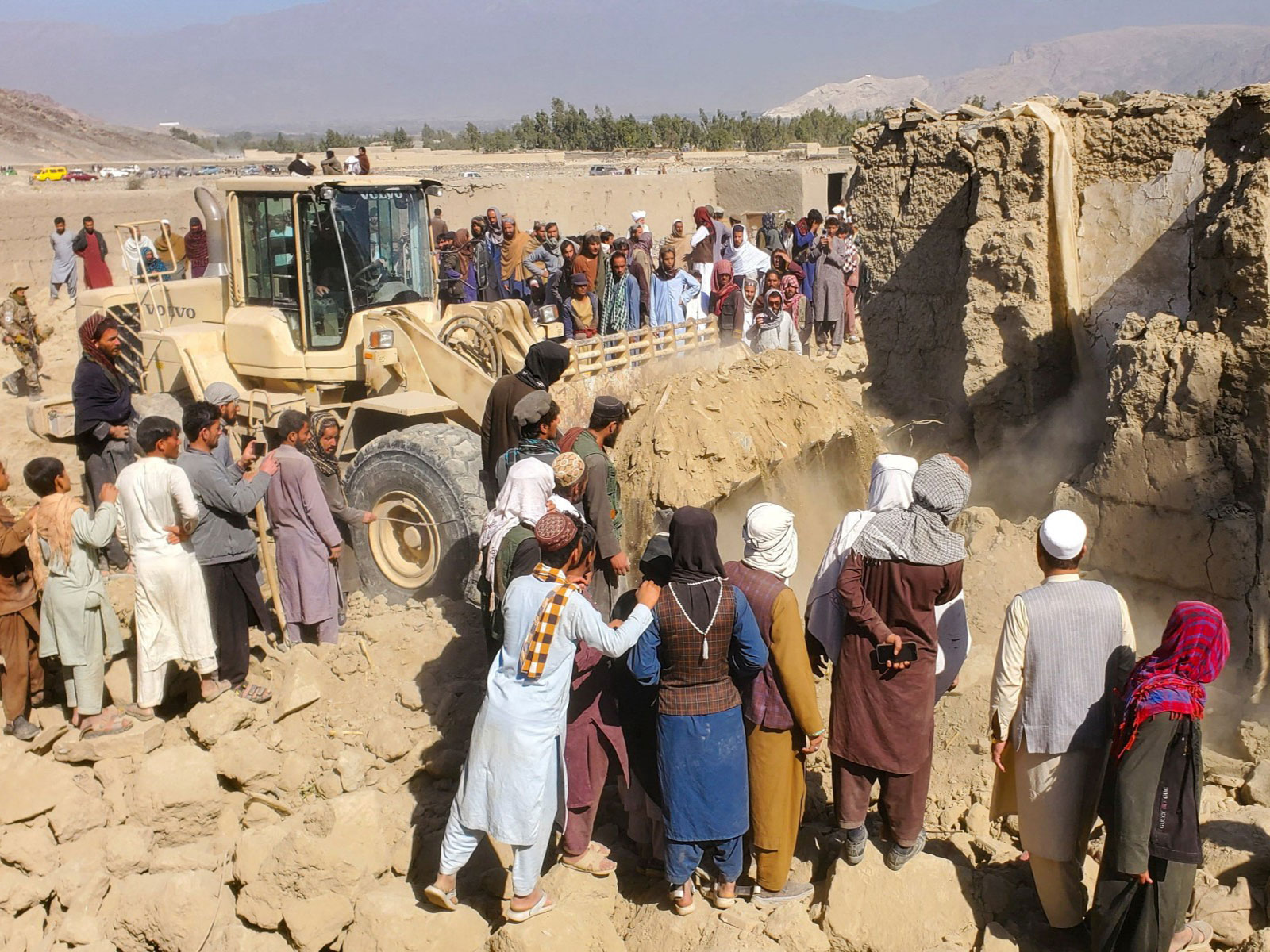 Residents gather at the site, following the Pakistani airstrikes, in Bihsud district, Nangarhar province, Afghanistan (Photo/Reuters)