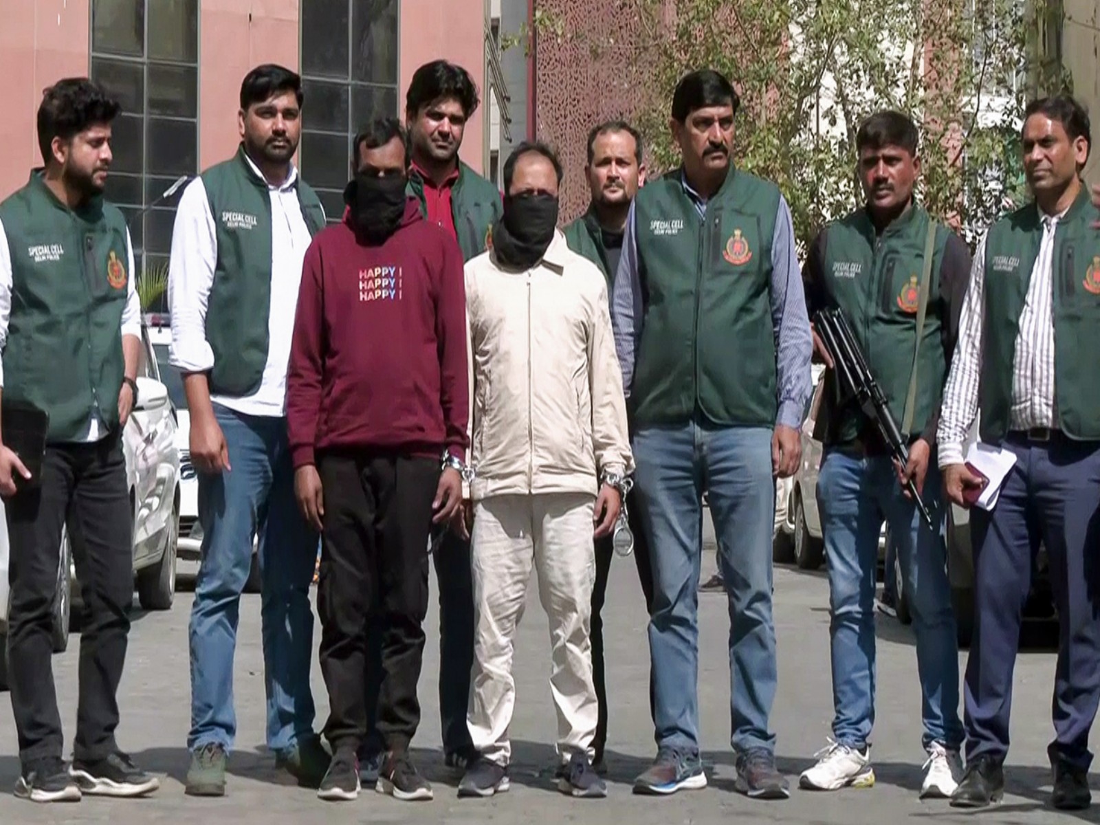 Delhi Police team with two of the arrested accused (Photo/ANI) Delhi Police team with two of the arrested accused (Photo/ANI)