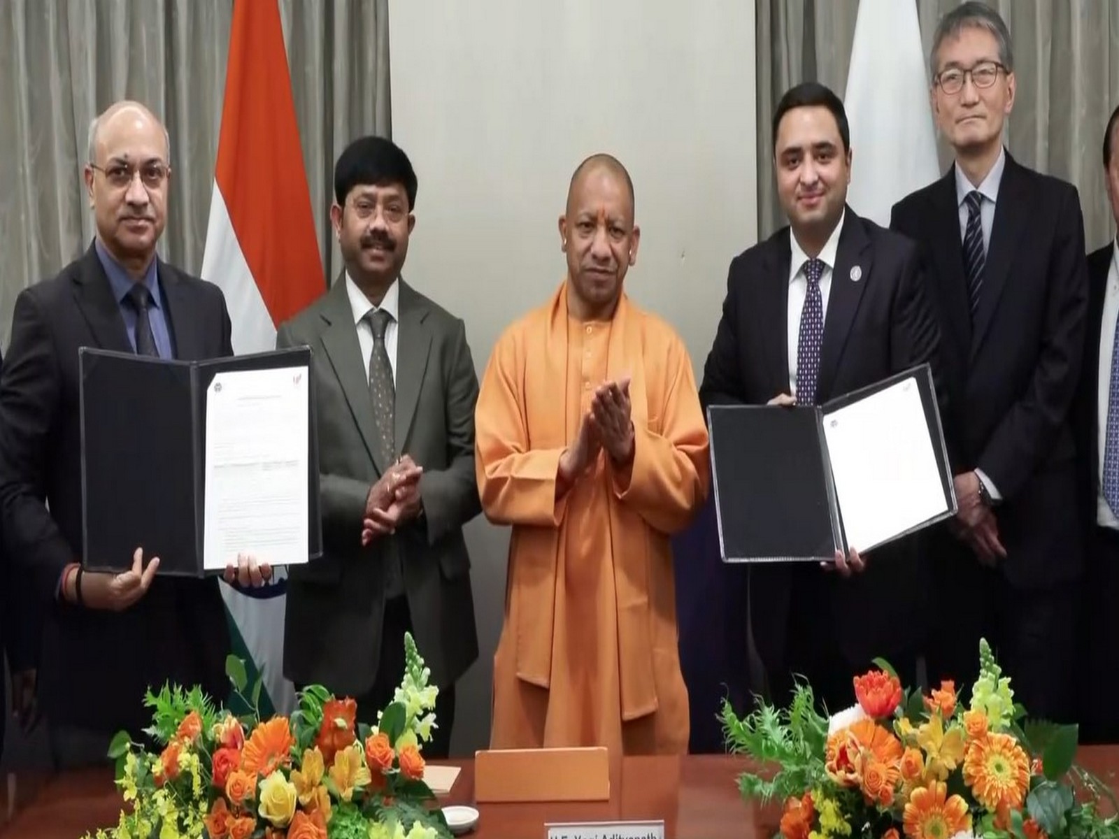 Uttar Pradesh Chief Minister Yogi Adityanath with delegation of Minda Corporation(Photo/ANI)