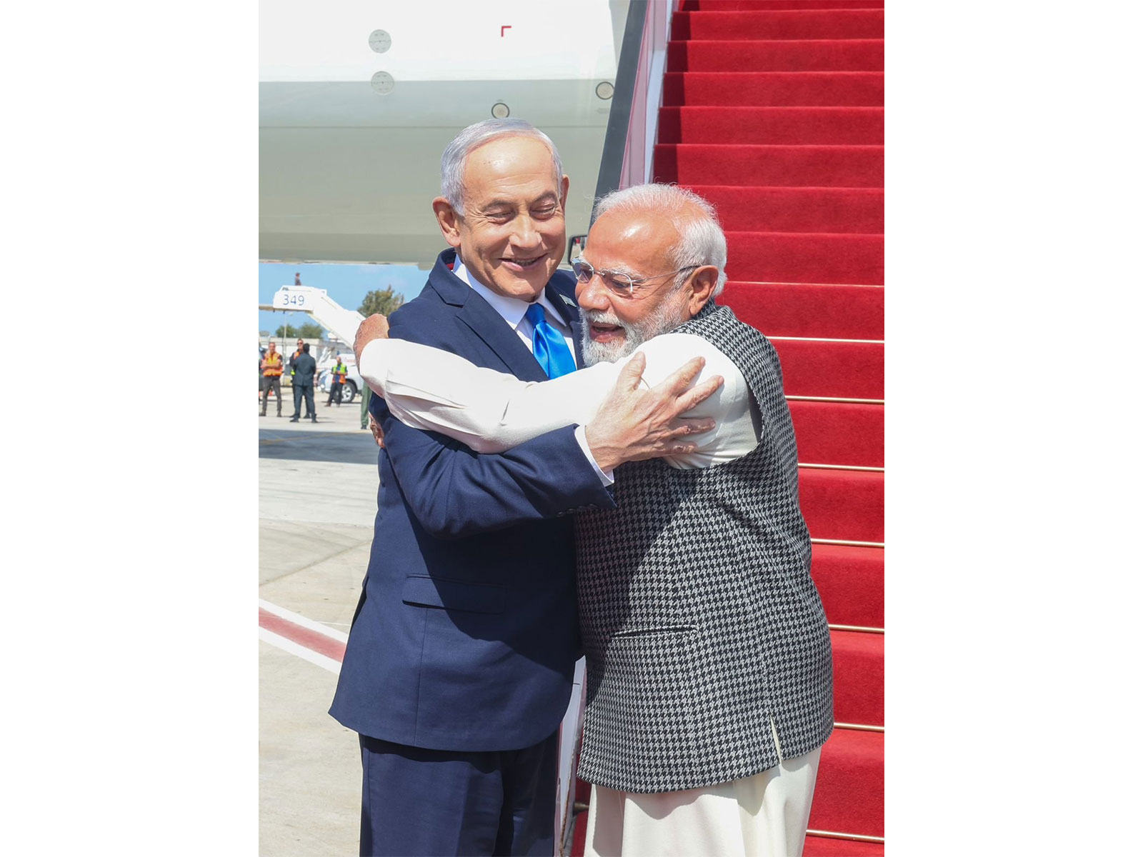 Prime Minister Narendra Modi and Israeli Prime Minister Benjamin Netanyahu share a warm hug at Ben Gurion Airport. (Photo: X/@narendramodi)