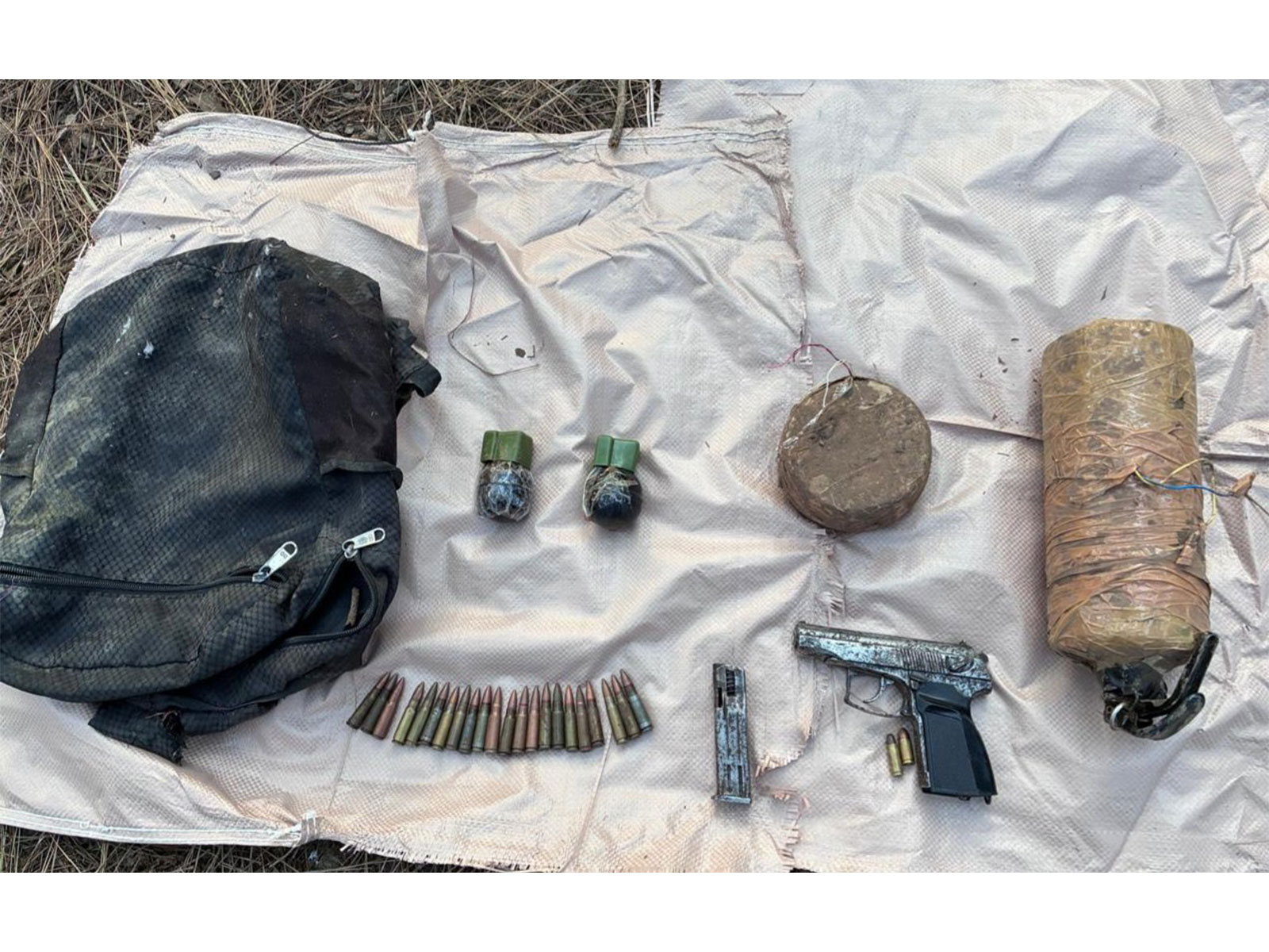 Terrorist cache concealed beneath a natural cave recovered in Poonch. (photo/@Whiteknight_IA)
