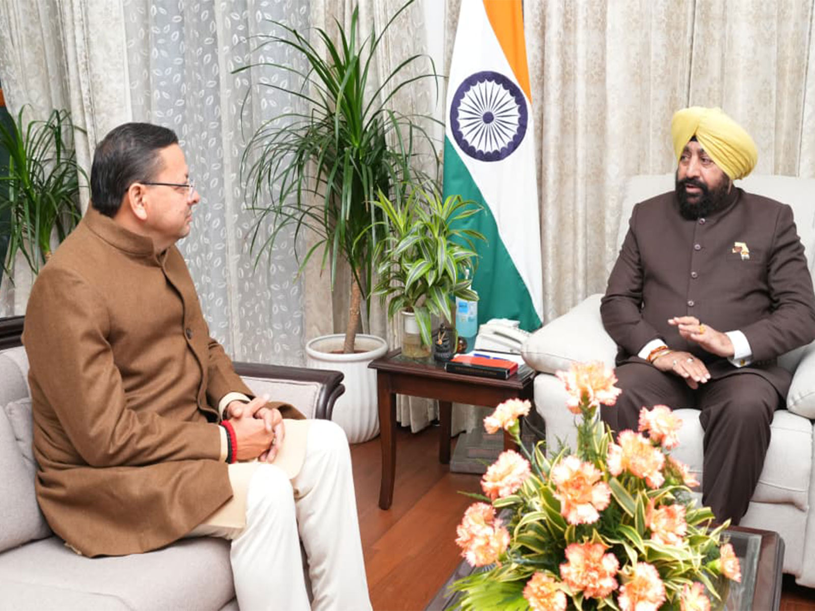 Chief Minister Pushkar Singh Dhami meets Governor Gurmit Singh (Photo/ANI)