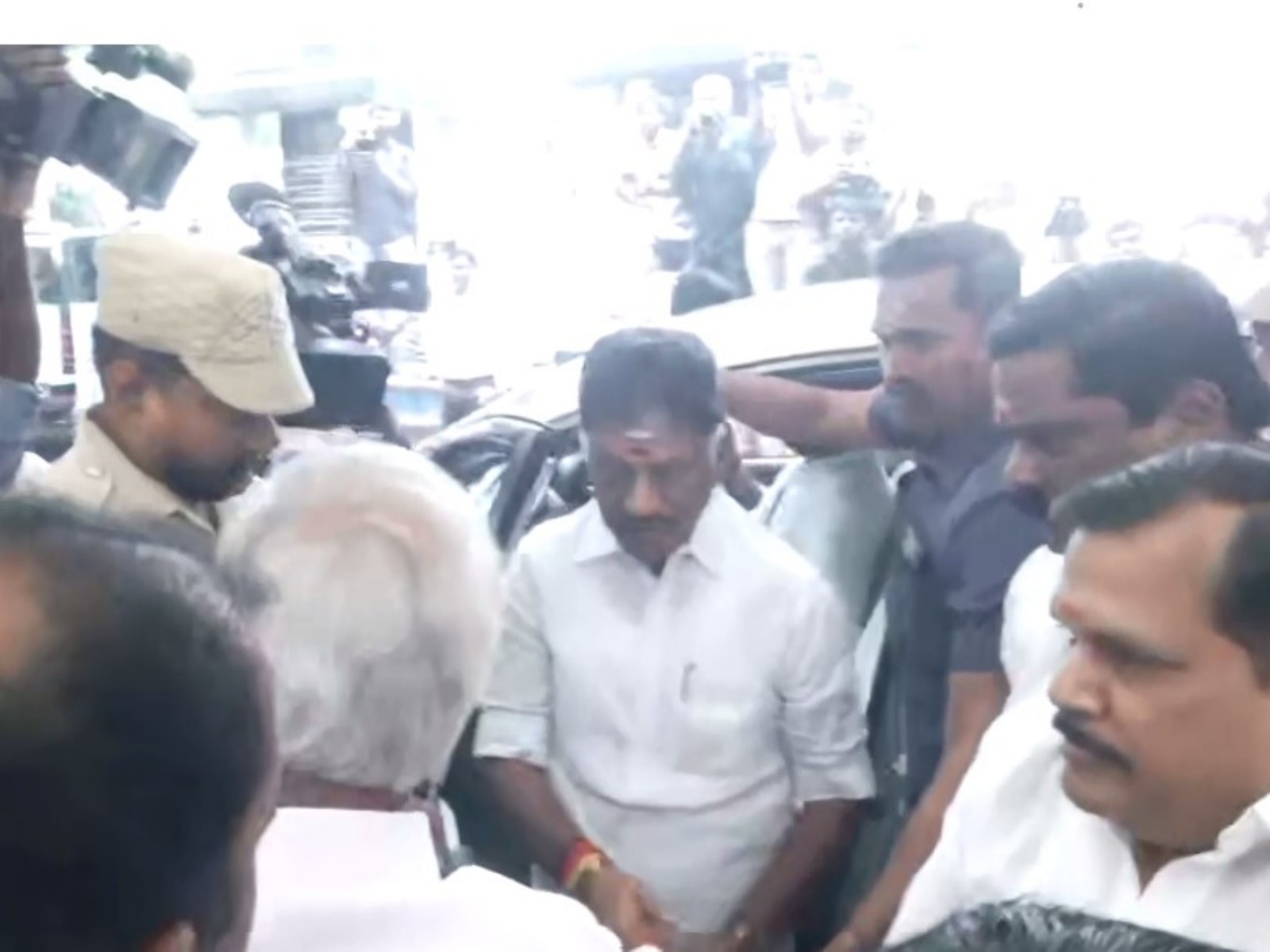OPS arrives at DMK headquarters (Photo: ANI)
