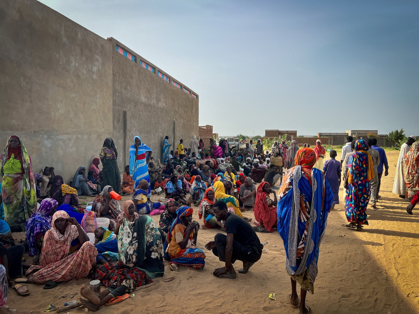 Sudanese refugees gather at Adre hospital in Chad as Doctors Without Borders (MSF) teams provide medical assistance to war-wounded patients from West Darfur, Sudan. (Photo/Reuters)