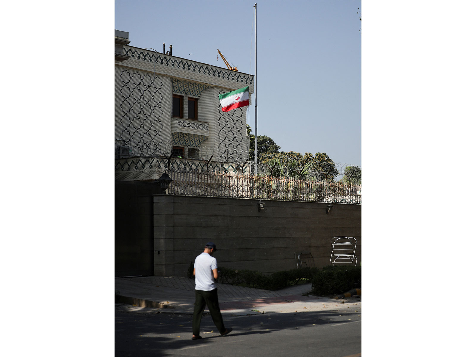 Iran’s national flag is lowered to half mast after Iran's Supreme Leader Ayatollah Ali Khamenei was killed in Israeli and U.S. strikes on Saturday, at the Iran's embassy in New Delhi (Photo/Reuters) Iran’s national flag is lowered to half mast after Iran's Supreme Leader Ayatollah Ali Khamenei was killed in Israeli and U.S. strikes on Saturday, at the Iran's embassy in New Delhi (Photo/Reuters)