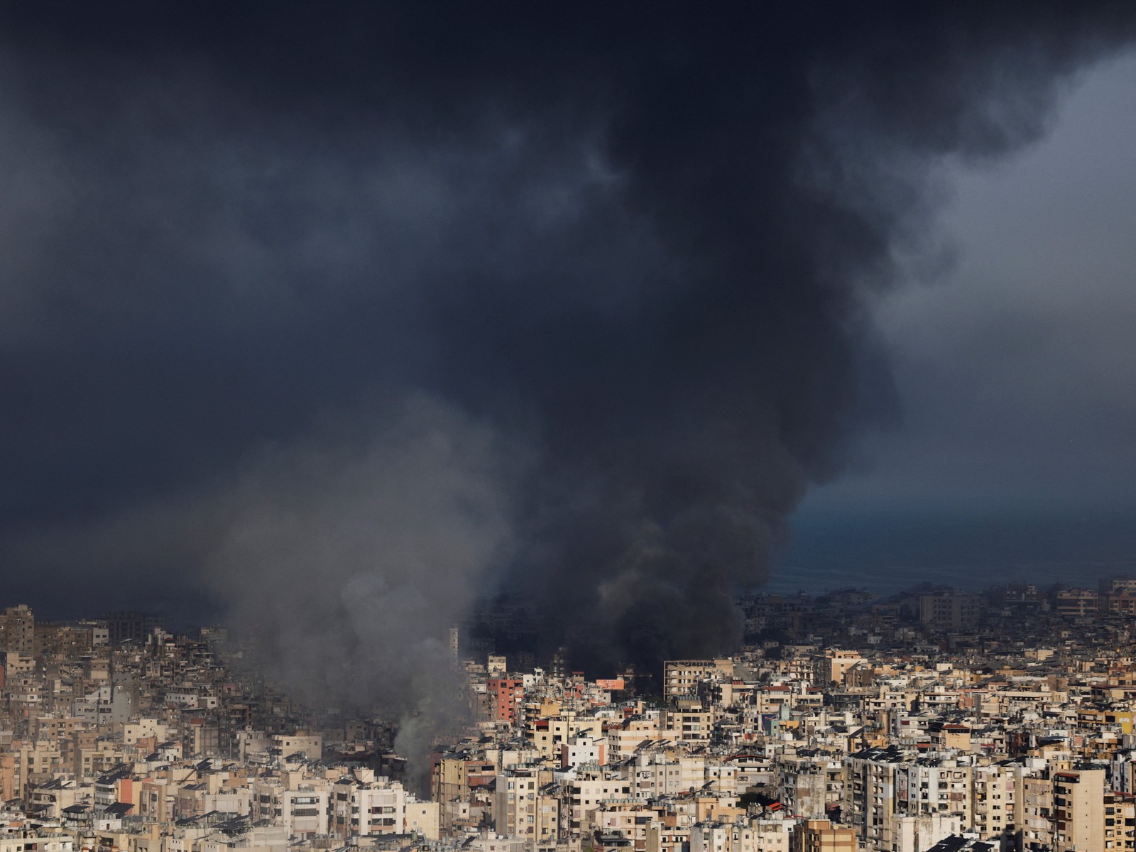 Smoke rises after an Israeli strike on Beirut's southern suburbs, following an escalation between Hezbollah and Israel (Photo/ Reuters) Smoke rises after an Israeli strike on Beirut's southern suburbs, following an escalation between Hezbollah and Israel (Photo/ Reuters)