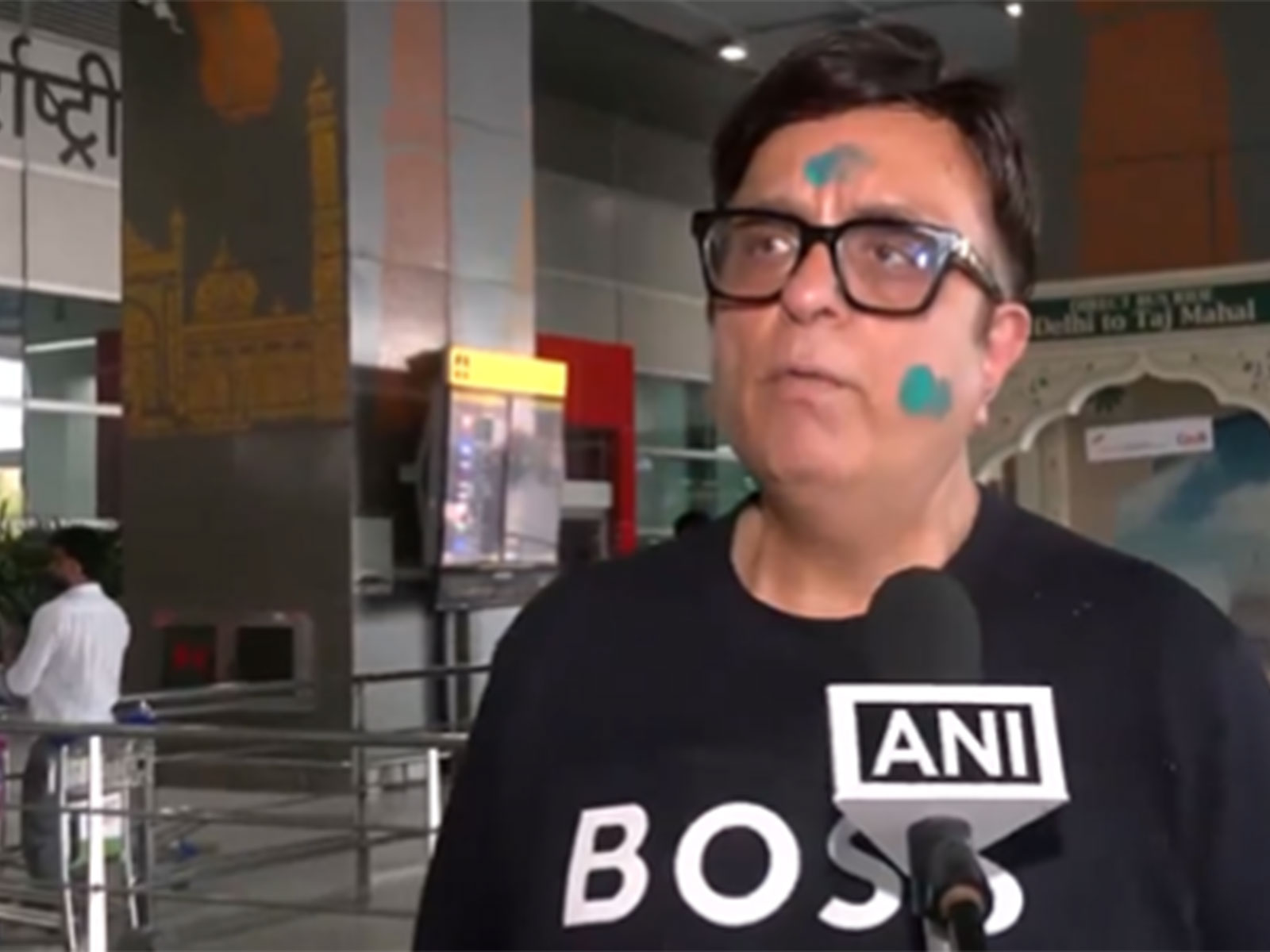 A passenger who arrived at IGI Airport from Dubai (Photo/ANI)