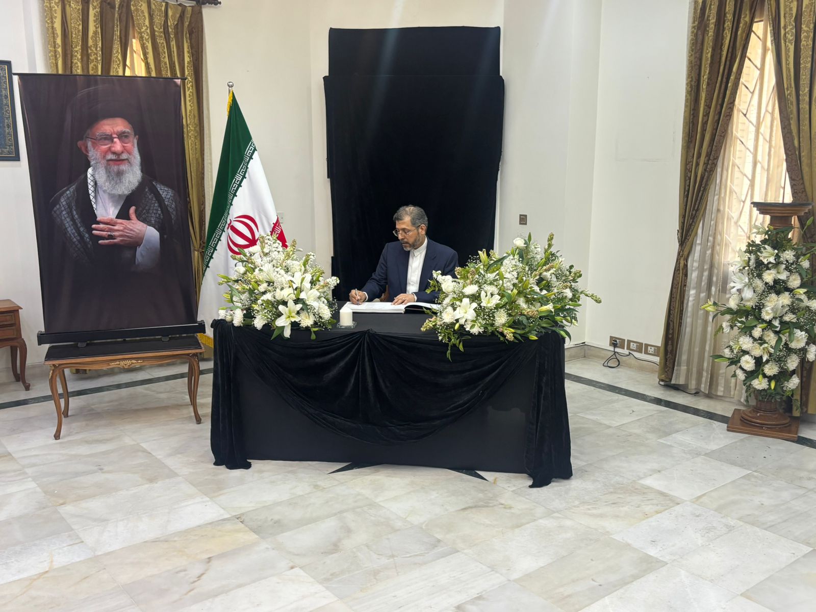Iranian Deputy Foreign Minister Saeed Khatibzadeh signs the condolence book at the Iranian Embassy in New Delhi following the death of Supreme Leader Ayatollah Ali Khamenei. (Photo/ANI)
