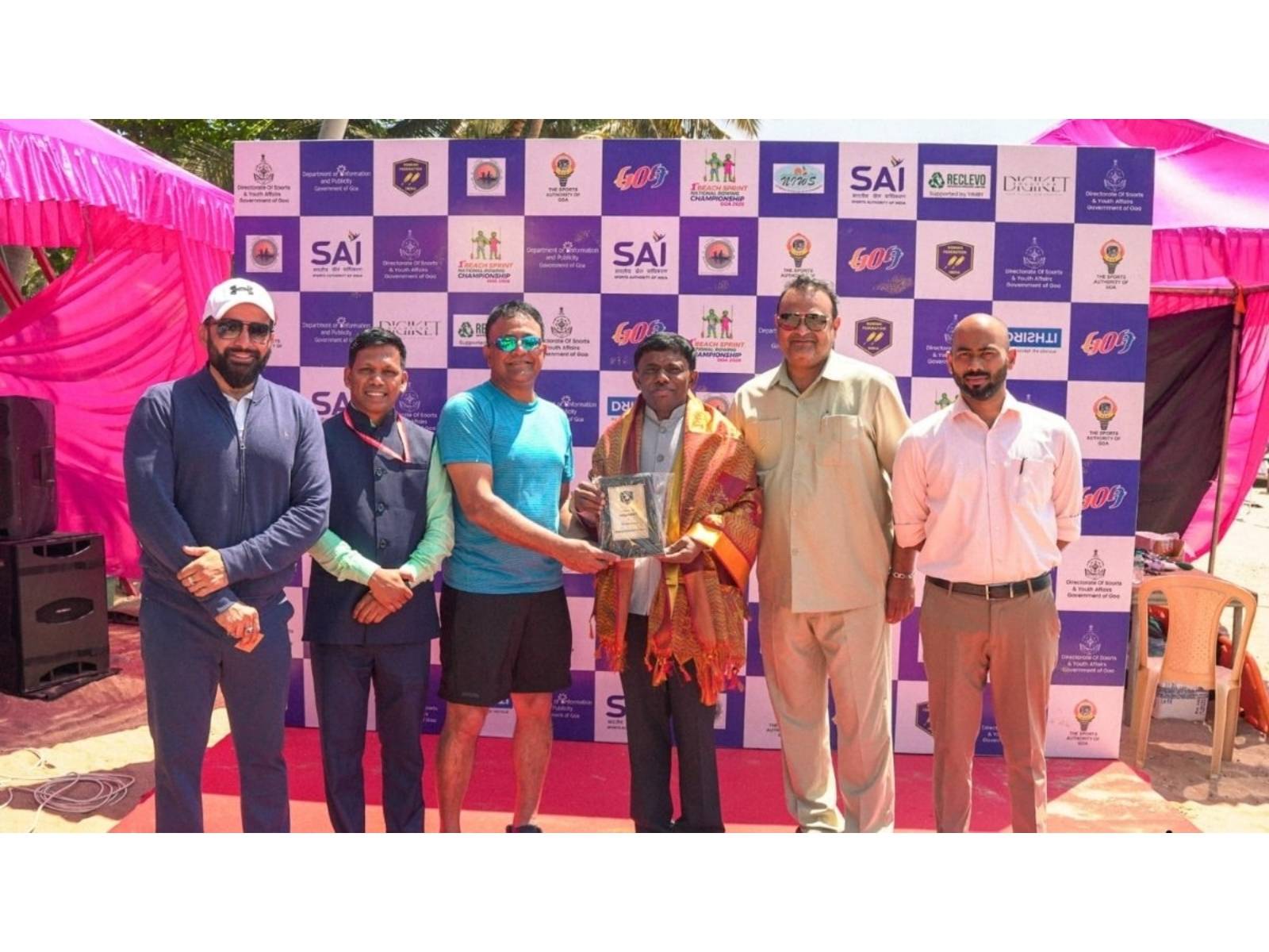 Tapan Acharya with Goa Sports Minister Dr. Ramesh Tawadkar, RFI President Balaji Madarappa, and officials during a rowing event in Goa.