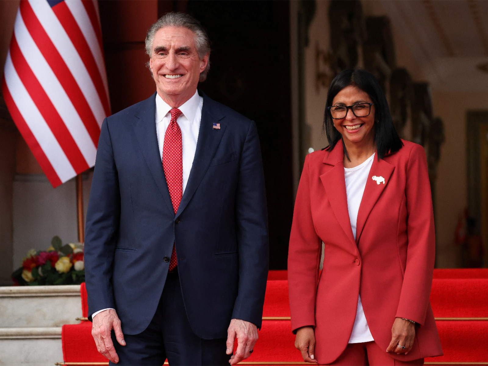 Venezuela's interim President Delcy Rodriguez and U.S. Interior Secretary Doug Burgum stand together as they attend to deliver statements at Miraflores Palace, in Caracas, Venezuela, March 4, 2026 (Photo/Reuters)