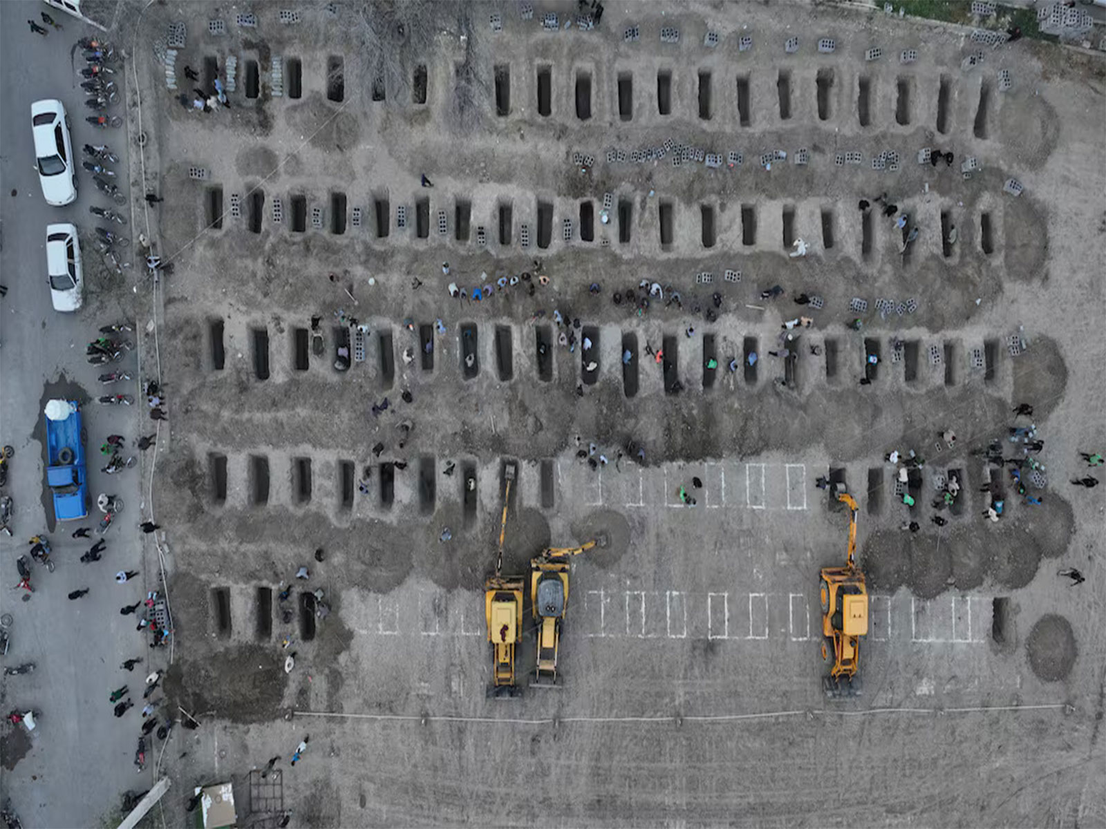 Graves prepared for victims following a reported strike on a girls’ school in Minab, Iran. (Photo/Reuters)